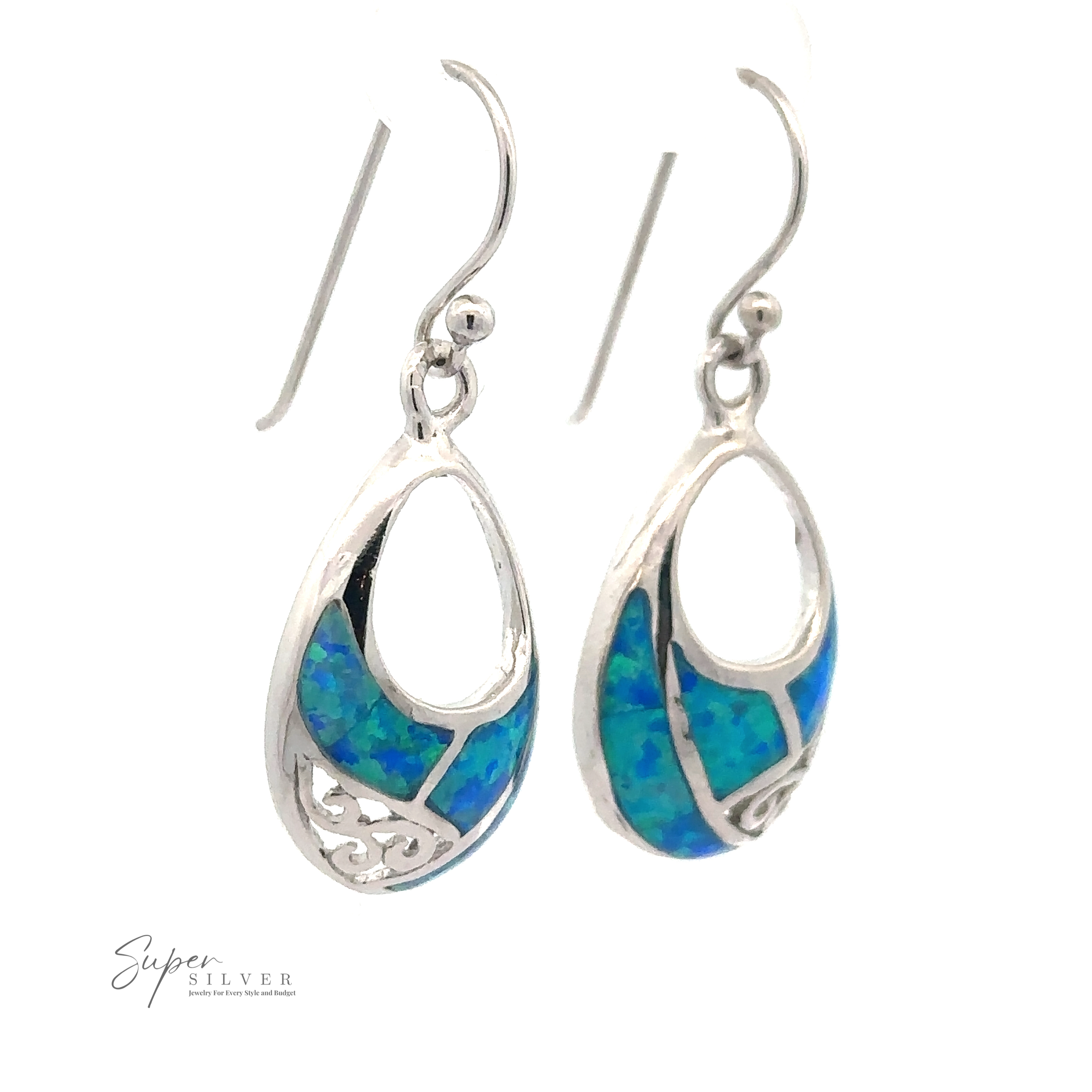 Blue Lab-Created Opal Teardrop Earrings feature sterling silver settings with blue opal inlay and intricate filigree accents, shown on a white background.
