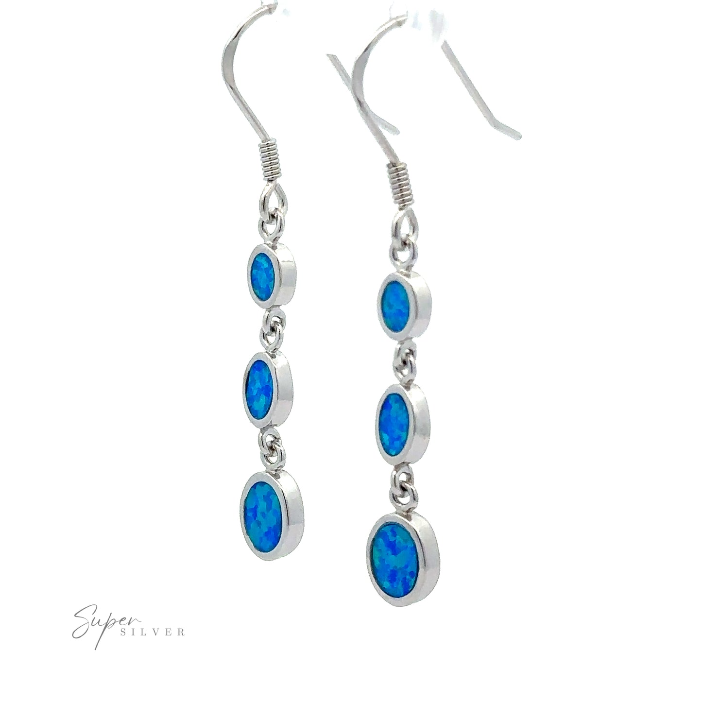 
                  
                    Long Oval Blue Lab-Created Opal Earrings made of sterling silver, featuring a geometric design with three vertically aligned oval blue lab-created opal gemstones.
                  
                