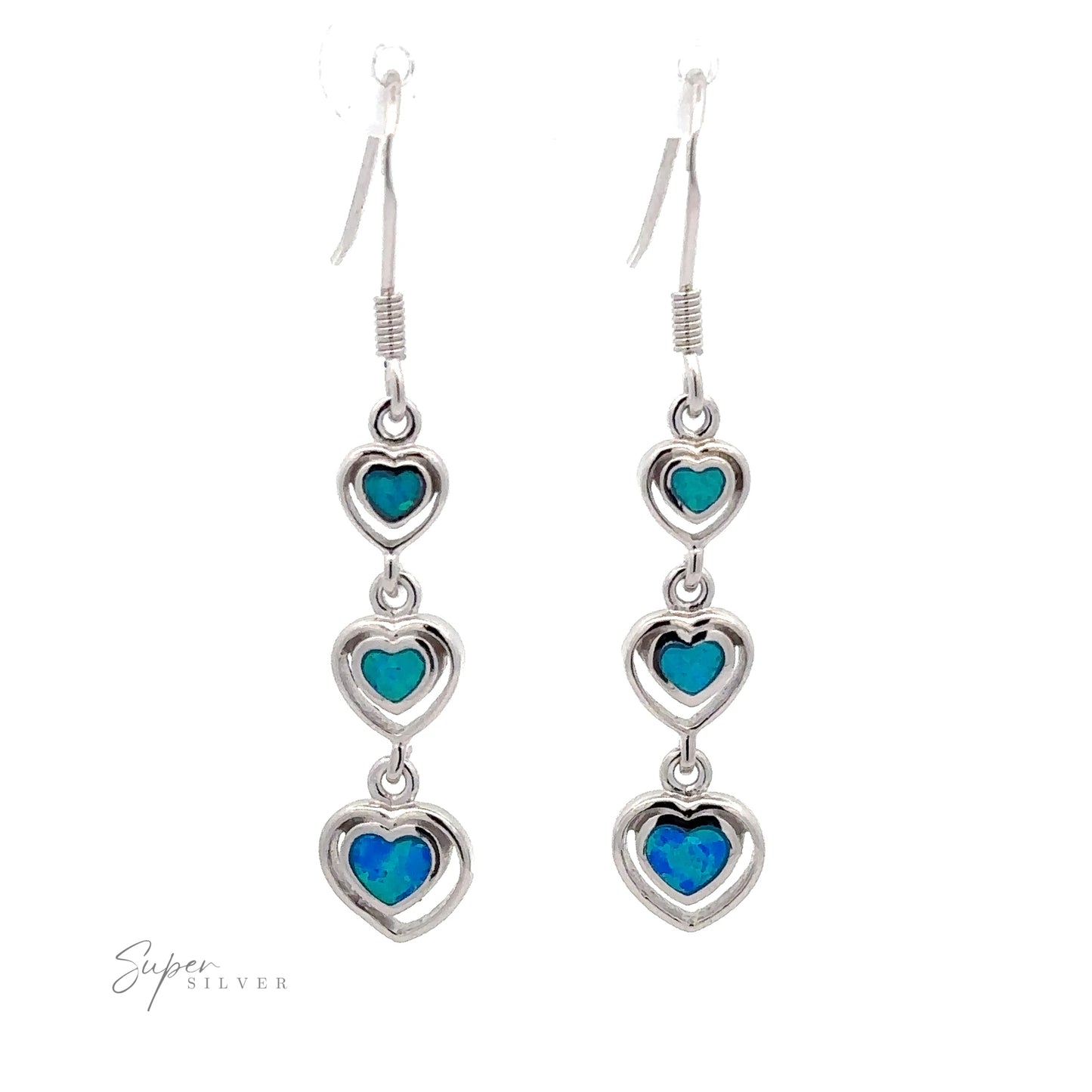 
                  
                    Dangling Lab-Created Opal Heart Earrings featuring three heart-shaped blue lab-created opals in sterling silver settings, with the "Super Silver" logo visible in the bottom left corner.
                  
                