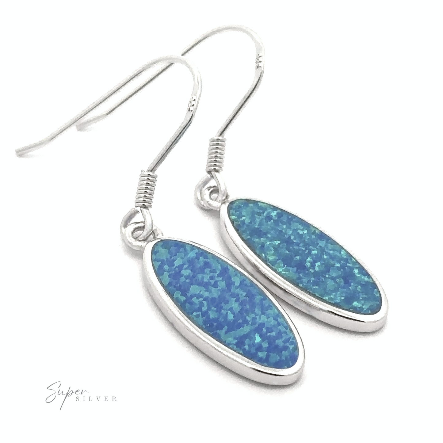 
                  
                    A pair of Simple Oval Lab-Created Opal Earrings, featuring meticulously crafted silver drop designs with stunning blue opal gemstones that capture pure elegance.
                  
                