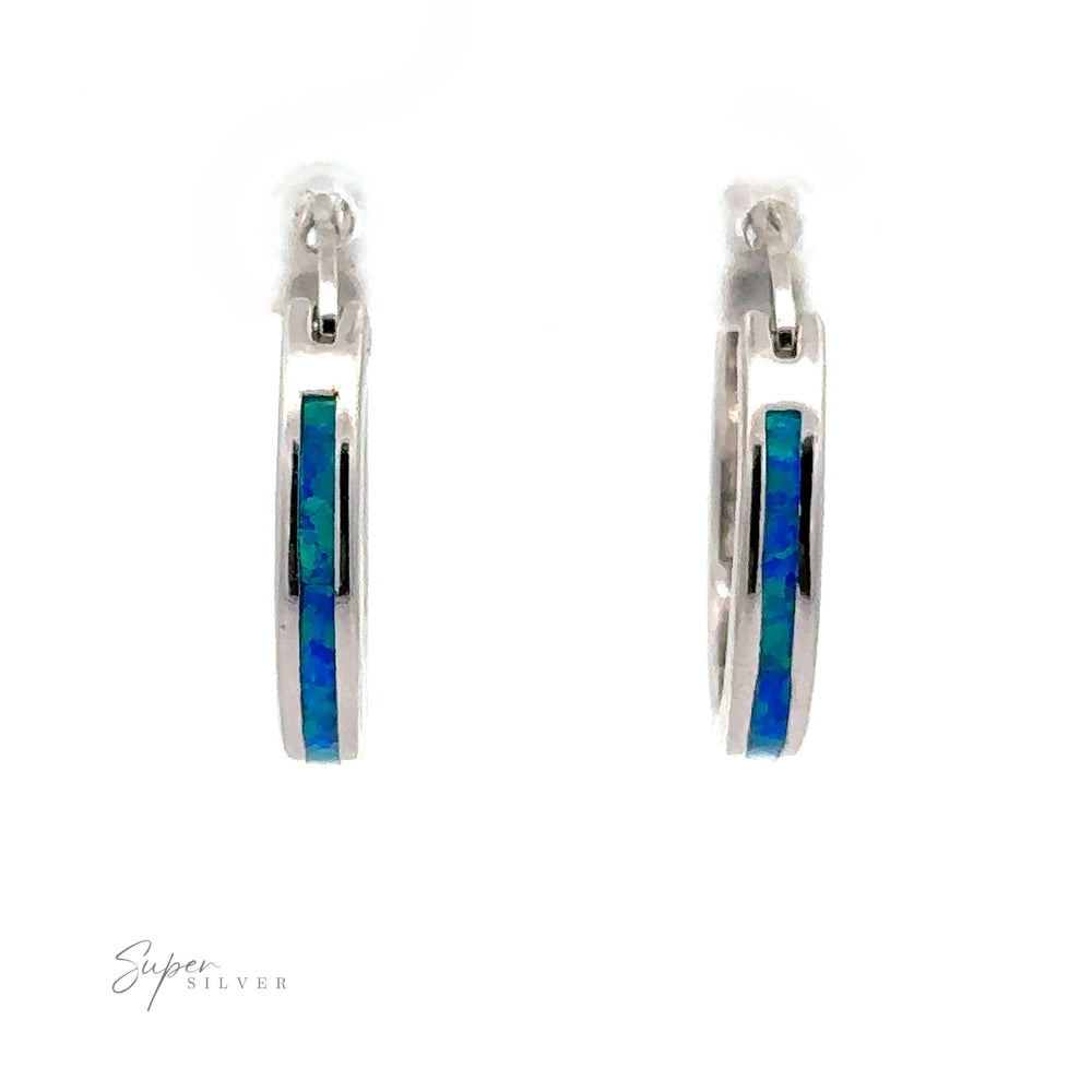 
                  
                    Product Name: Blue Lab-Created Opal Hoop Earrings with a white background featuring a rhodium finish and striking blue lab-created opal inlay.
                  
                