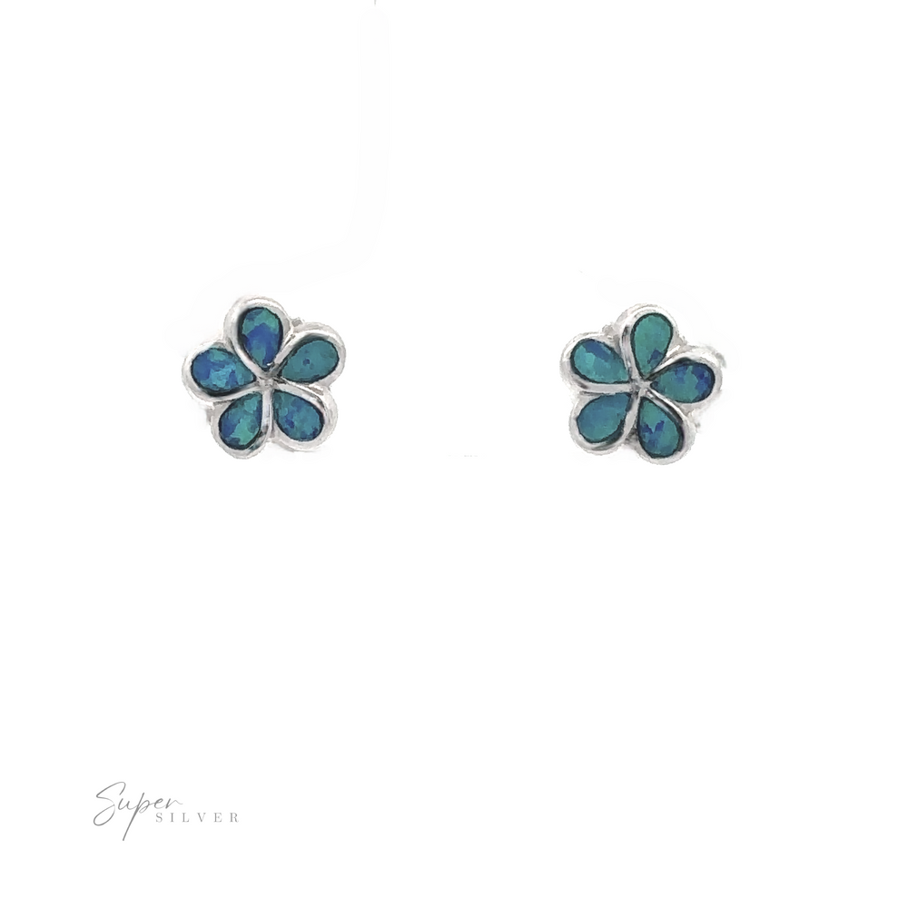 
                  
                    The Small Plumeria Lab-Created Opal Stud Earrings feature delicate blue and turquoise petals set in a sterling silver frame, highlighted with blue lab-created opal, and are displayed on a white background.
                  
                