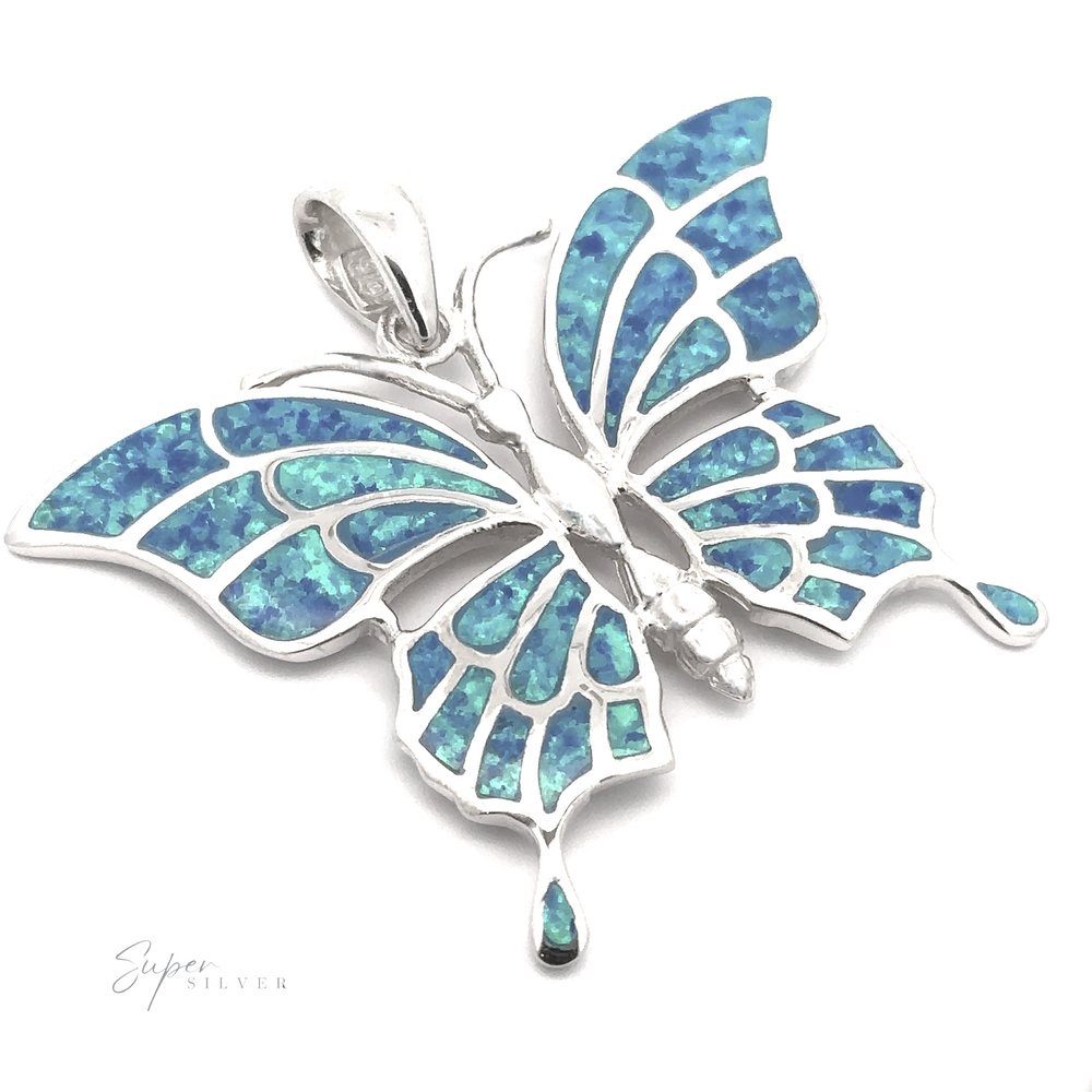 
                  
                    The Statement Lab-Created Opal Butterfly Pendant is a stunning piece, featuring intricate blue and green enamel detailing on its wings, crafted in shimmering sterling silver. Highlighted with a lab-created opal, this eye-catching accessory adds elegance to any outfit.
                  
                