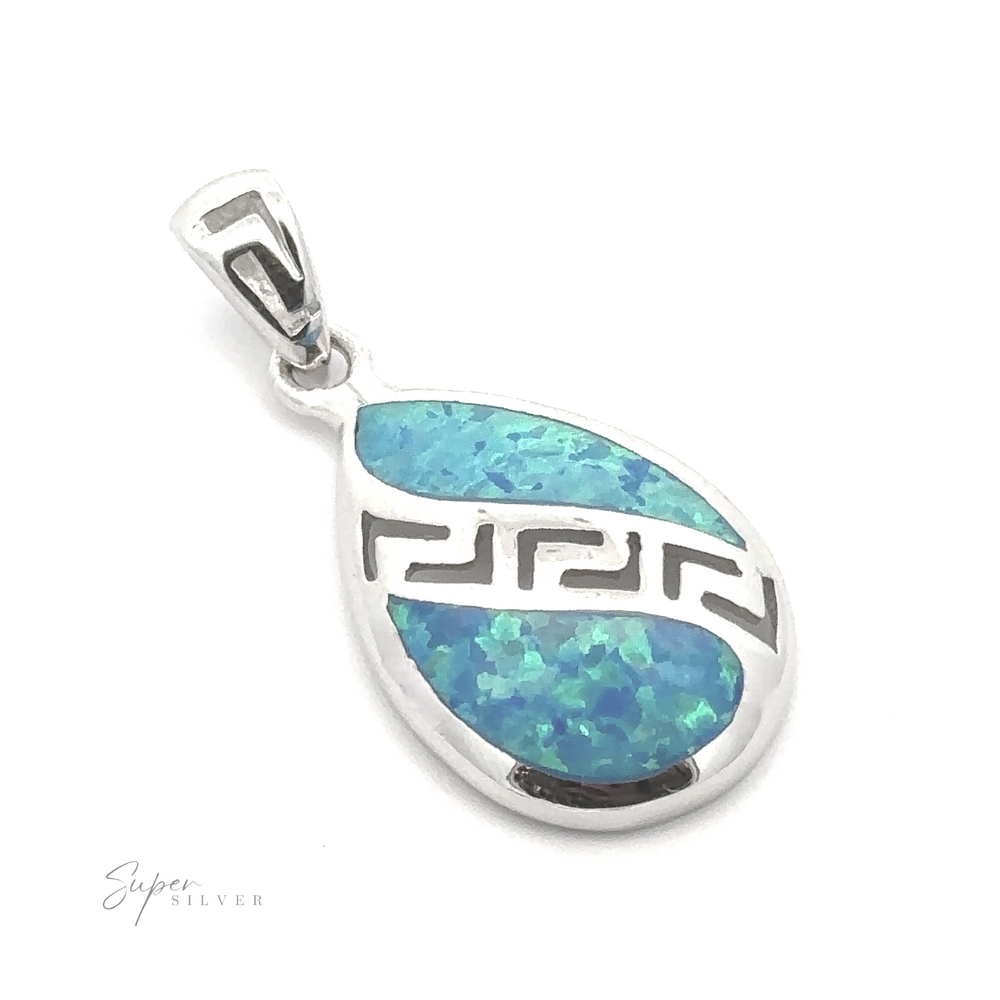 
                  
                    A Teardrop Lab-Created Opal Pendant with a silver teardrop-shaped design, featuring blue and green iridescent sections and geometric cutouts, including an elegant Greek key pattern. The signature "Super Silver" is visible in the bottom left corner.
                  
                