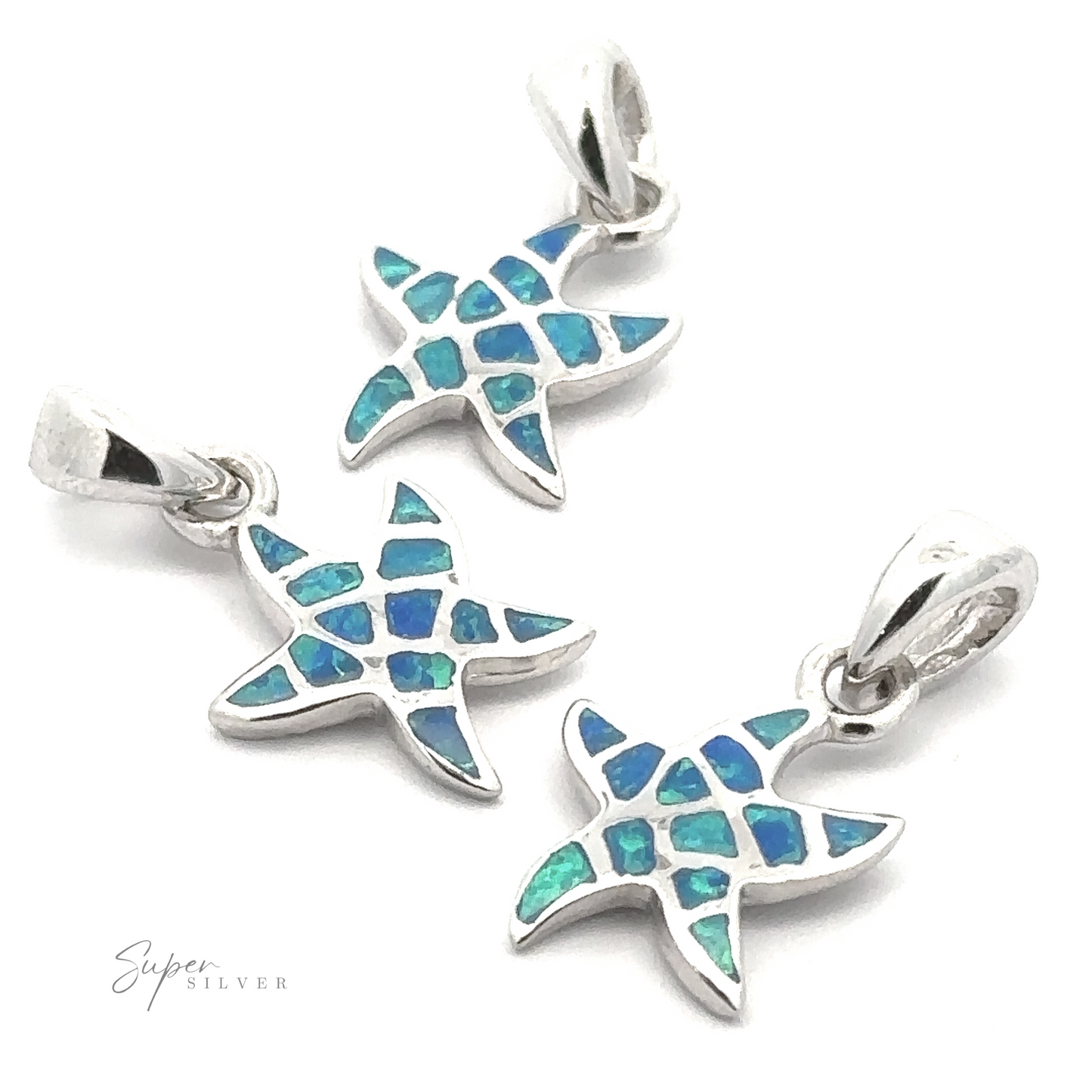 
                  
                    Three Small Lab-Created Opal Sea Star Pendants with blue and green mosaic inlays are arranged on a white background. The silver pendant bails are visible at the top.
                  
                