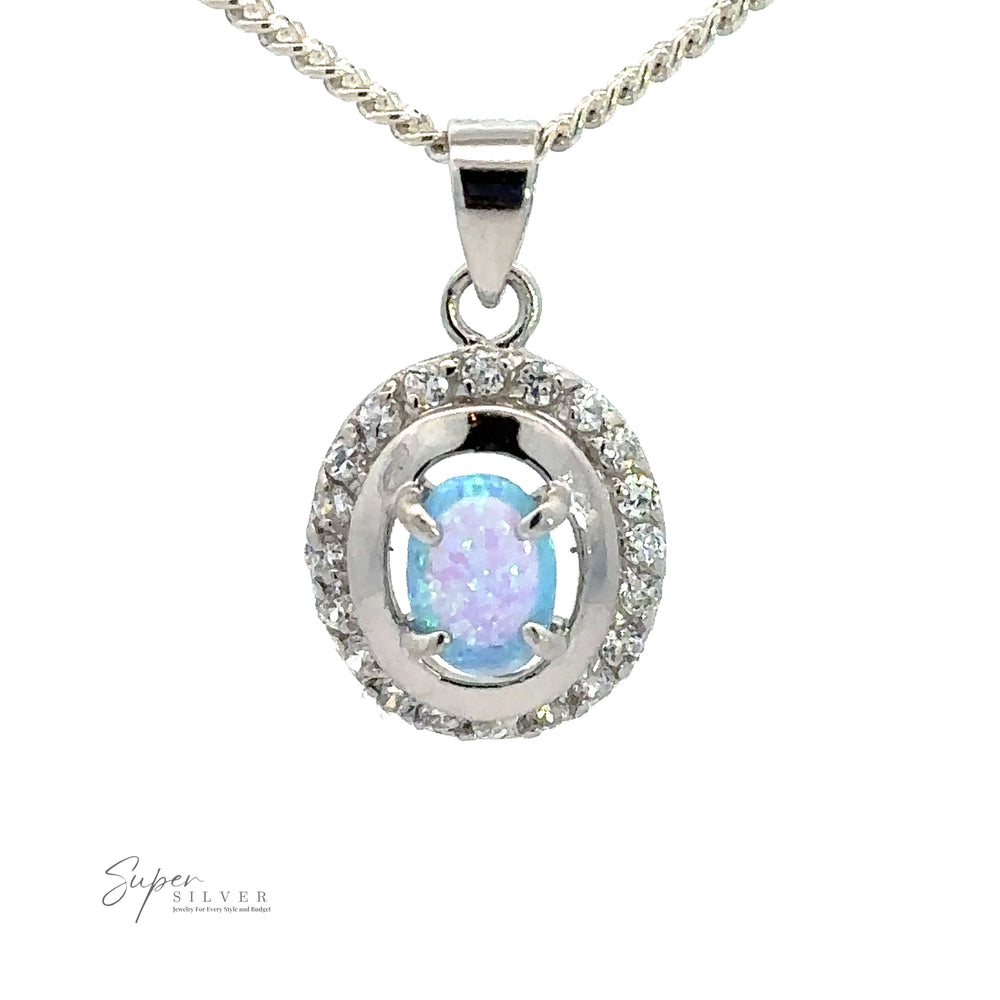 
                  
                    A silver necklace with a pendant featuring an oval-shaped lab-created opal at the center, surrounded by a circular arrangement of clear cubic zirconia stones, exuding the timeless elegance of Art Deco jewelry, Opal Pendants with Cubic Zirconia.
                  
                