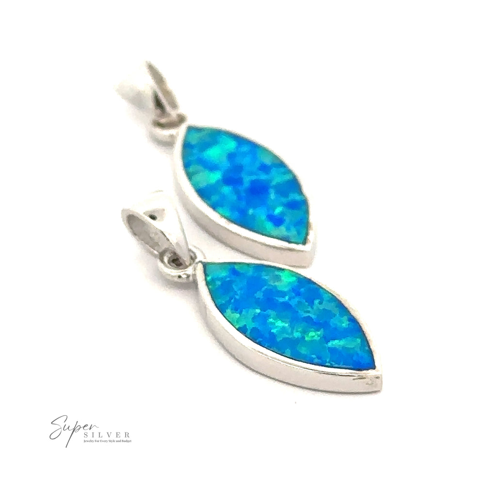 Two Marquise-Shaped Blue Opal Pendants with vibrant green accents are displayed on a plain white background. The rhodium-plated sterling silver enhances their brilliance. The brand name, "Super Silver," is visible in the bottom-left corner.