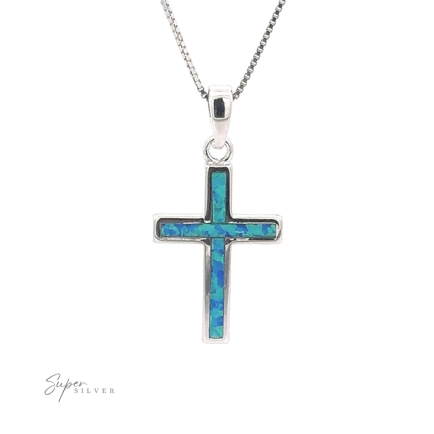 
                  
                    Crafted from sterling silver, the Lab-Created Opal Cross Pendants feature a minimalist design embellished with a beautiful blue-green mosaic inlay, offering an elegant touch when worn on its delicate chain.
                  
                