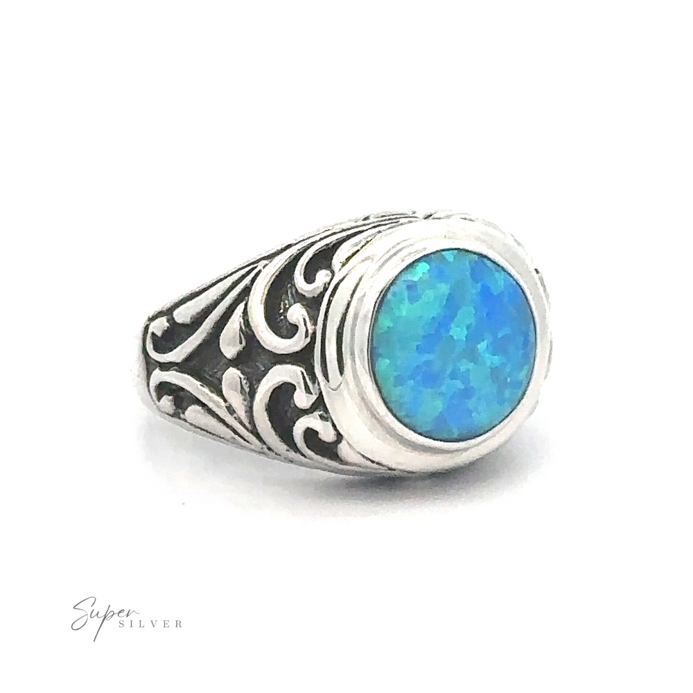 Opal Signet Ring with Bali Design with blue opal set in an ornate Bali Filigree band.
