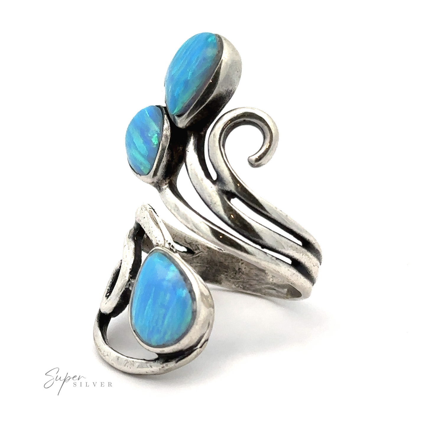 
                  
                    Stunning Wrap-Around Opal Ring featuring three blue opal stones in an organic, flowing design on a white background, handcrafted in America with .925 sterling silver.
                  
                