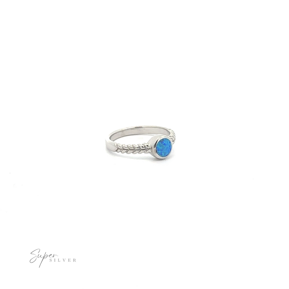 
                  
                    Half Braided Band with Round Opal ring, set against a white background.
                  
                