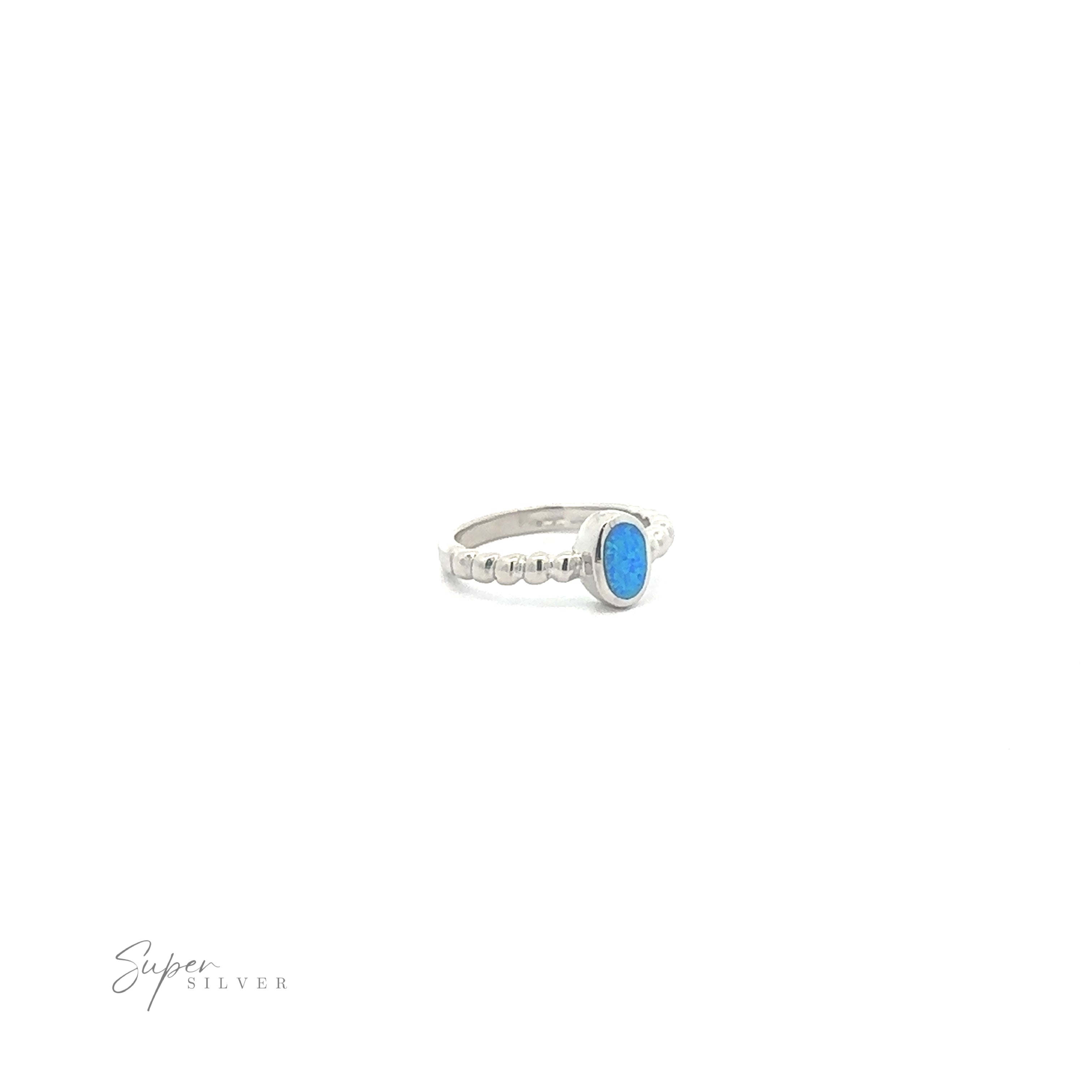 A sterling silver ring with a blue Oval Lab Opal with Beaded Band gemstone displayed on a white background.