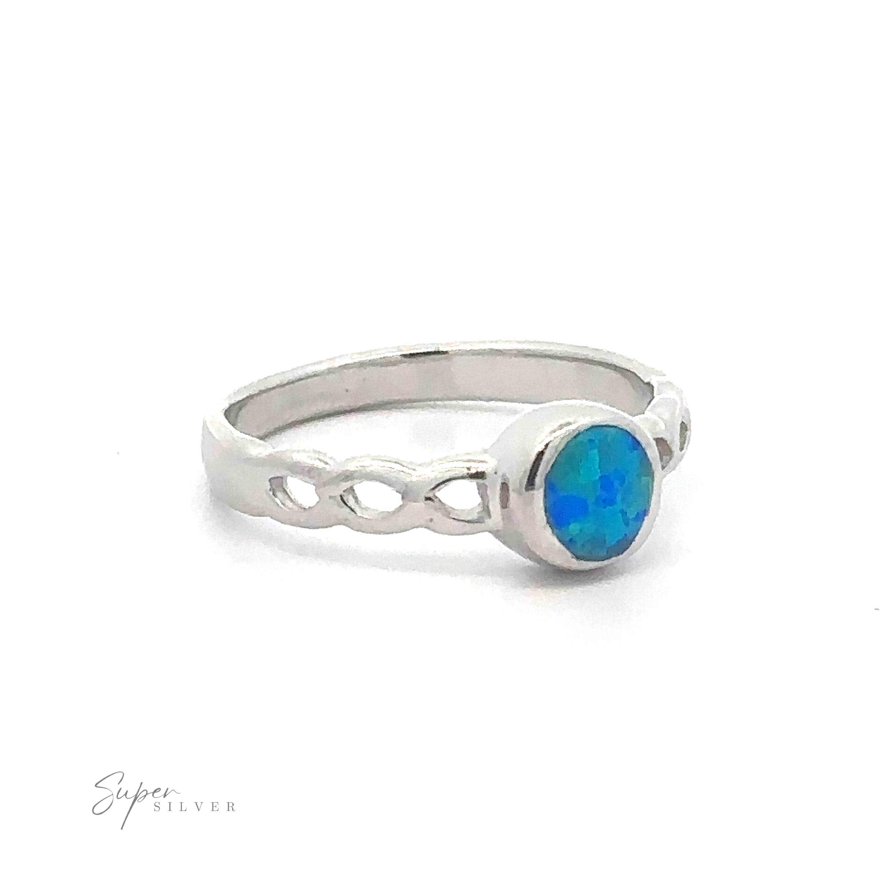 Round Lab Opal Ring with Weave Band with a lab-created blue opal stone set in a decorative band.