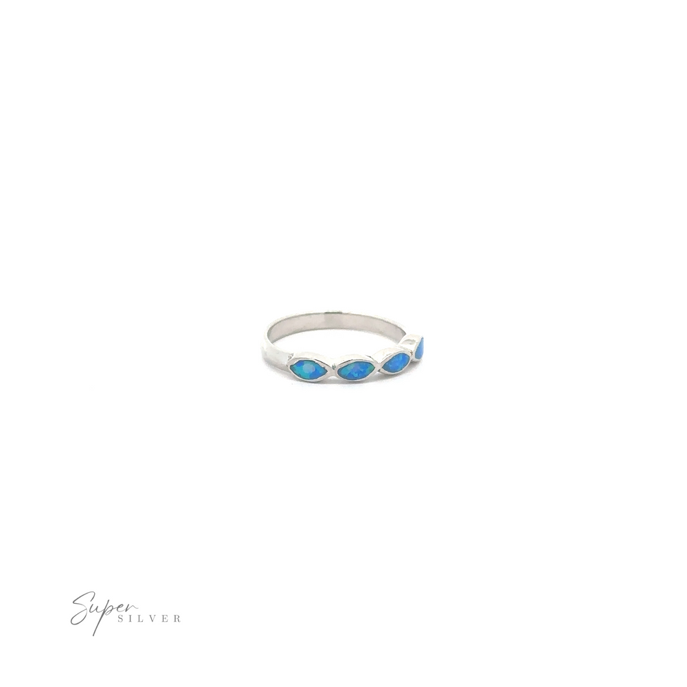 
                  
                    Stackable Blue Opal Ring with Marquise Stones on a white background.
                  
                