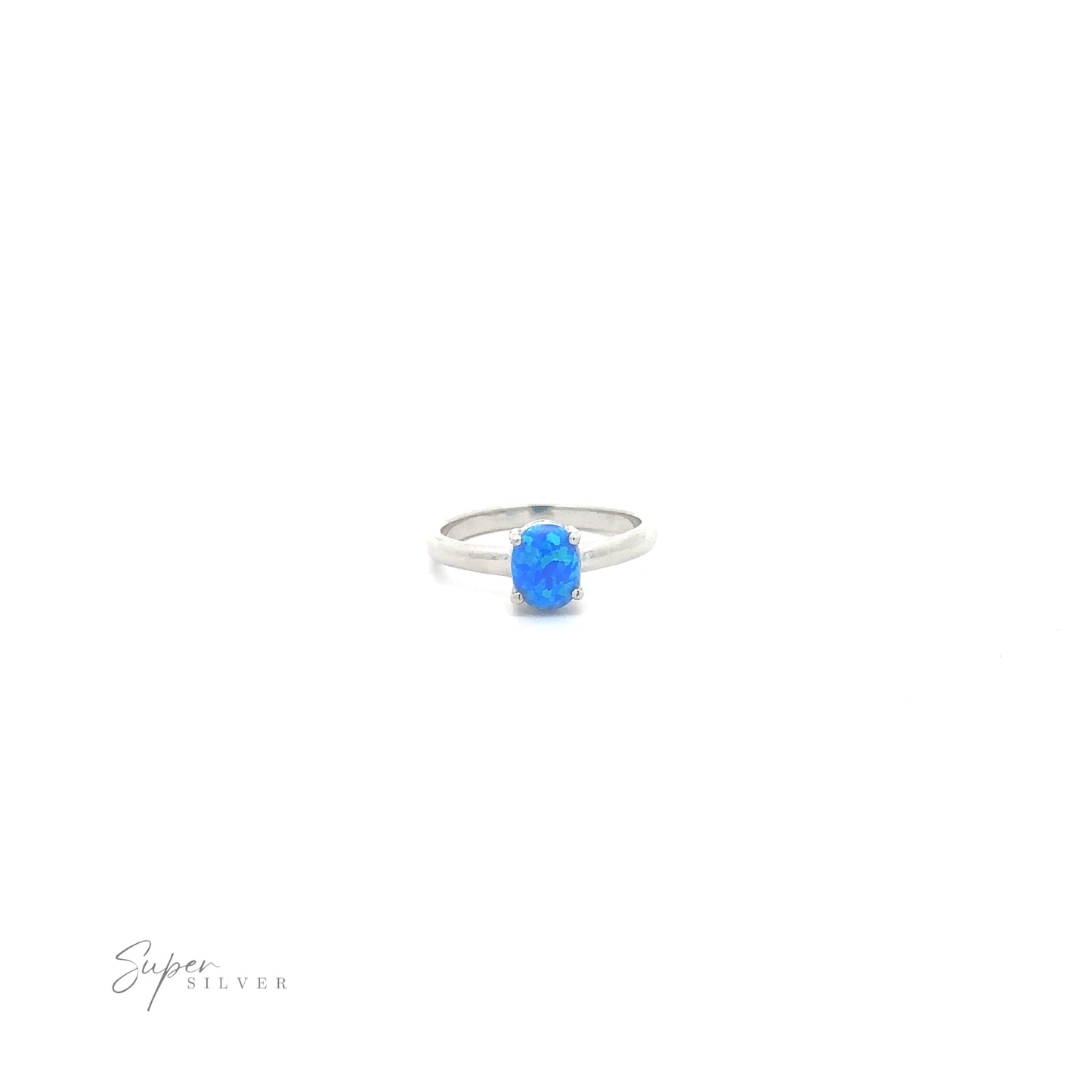 
                  
                    Simple Pronged Lab Opal Ring with a white background.
                  
                
