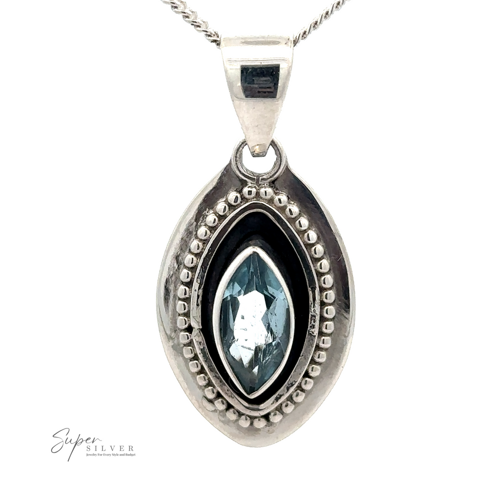 
                  
                    A Beautiful Marquise Pendant With Beaded Design, featuring a central blue topaz gemstone. The outer edge is adorned with small, round silver beads.
                  
                