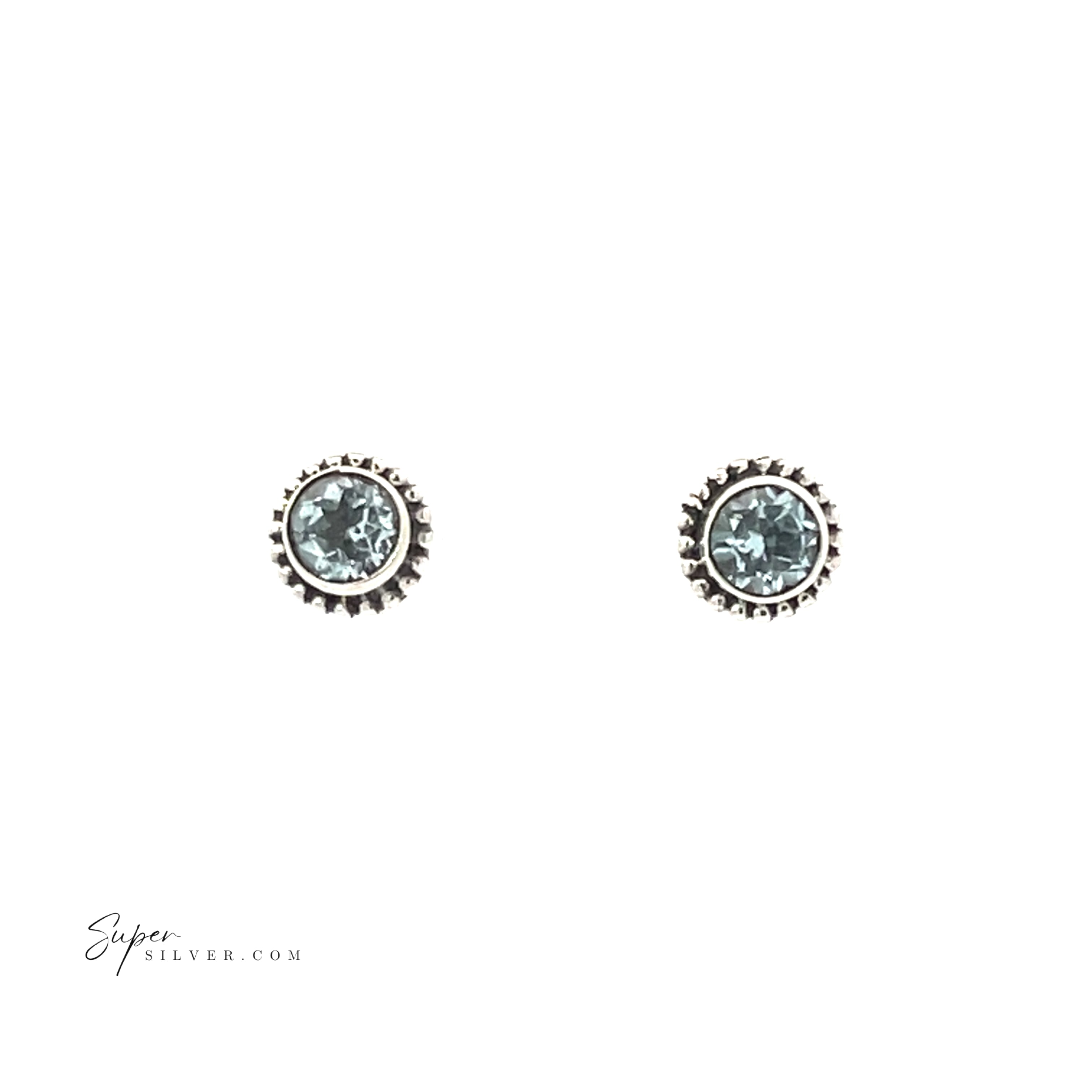 Beaded Round Faceted Gemstone Studs: round sterling silver stud earrings with light blue gemstones in decorative bezels, shown on a white background.