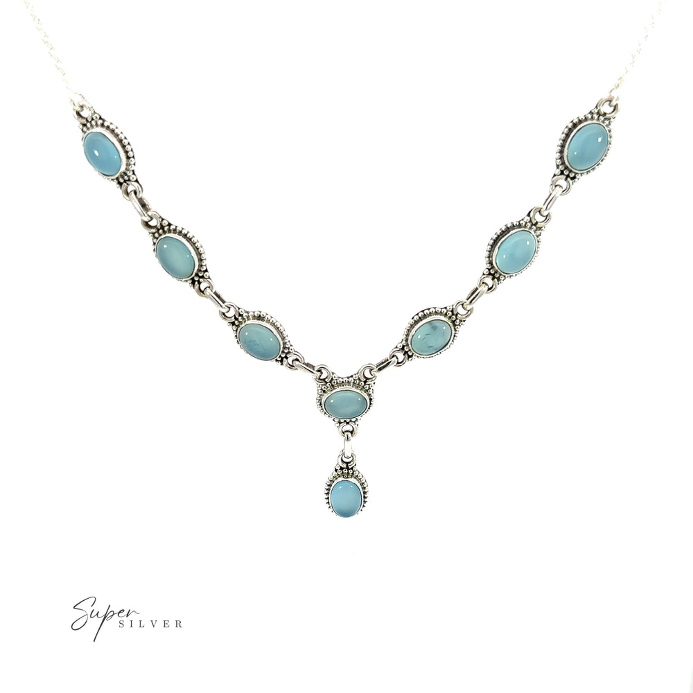 
                  
                    This Gemstone Y-Necklace with Beaded Border features stunning turquoise gemstones that have been carefully selected for their vibrant color and natural beauty. The necklace is made with a delicate silver chain that adds an elegant touch.
                  
                