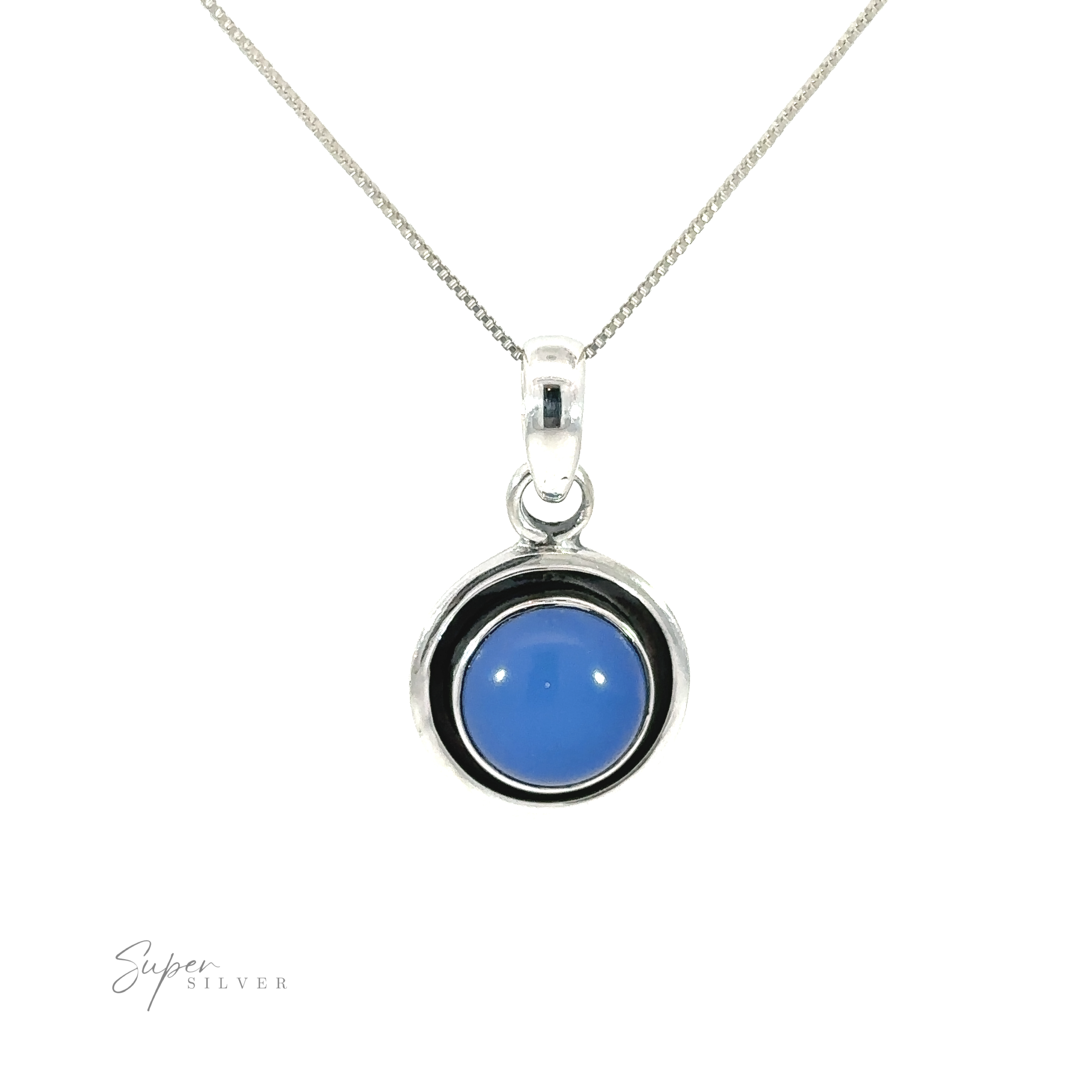 A Minimalist Round Gemstone Pendant with a blue stone and oxidized edge.