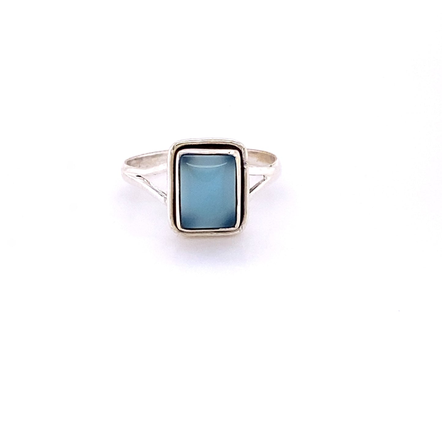 
                  
                    A stunning Simple Square Gemstone Ring featuring a rectangular blue stone set in a simple sterling silver square setting.
                  
                