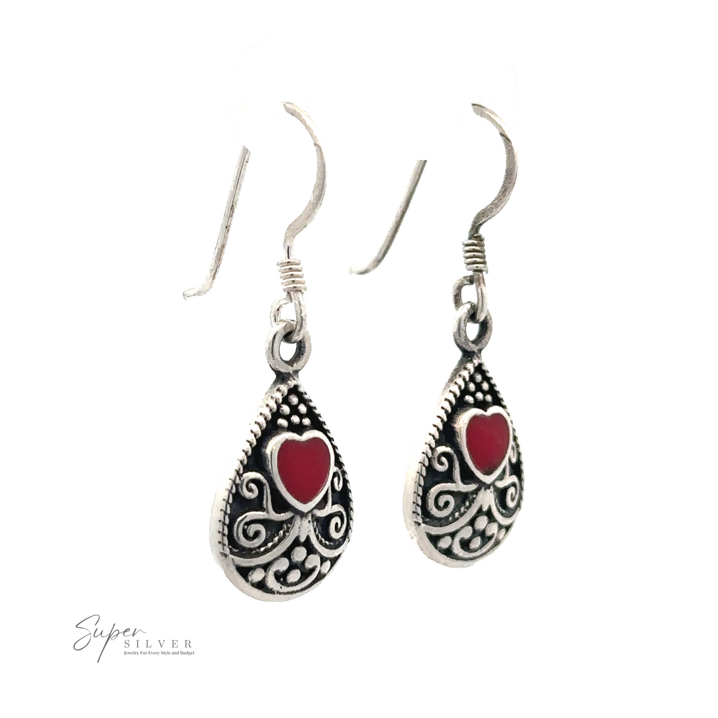 Bali Style Teardrop Earrings with Inlaid Stone featuring red heart motifs and intricate scrolling patterns, adorned with subtle Bali style elegance.