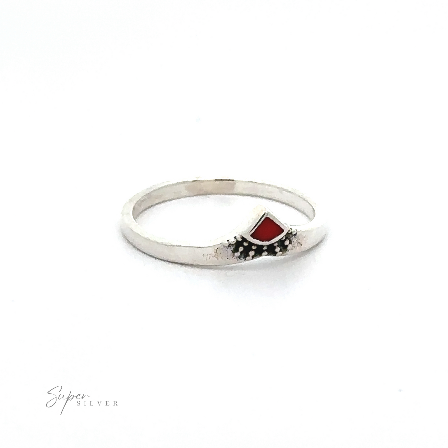 
                  
                    A Dainty Chevron Bali Style Inlay Ring with a red stone in the middle.
                  
                