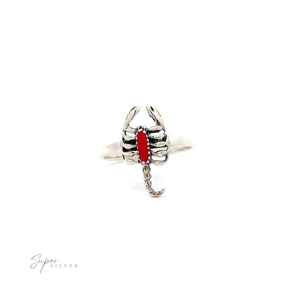 
                  
                    Small Scorpion Ring with Inlaid Stone shaped ring with a red gem on a white background.
                  
                