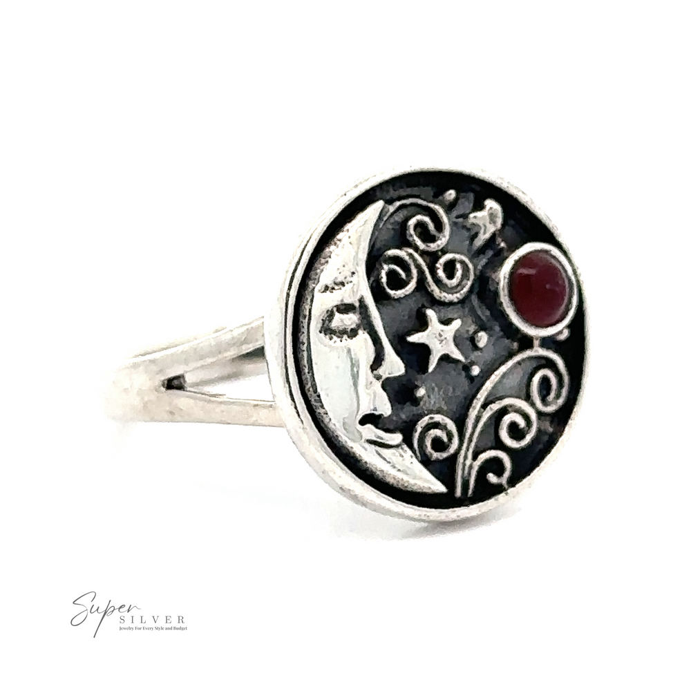 
                  
                    A Circular Vintage Style Moon Ring With Inlaid Stone in .925 sterling silver features a celestial design with a crescent moon, stars, and swirling patterns, highlighted by a small red gem. This beautiful piece radiates bohemian charm and timeless elegance.
                  
                