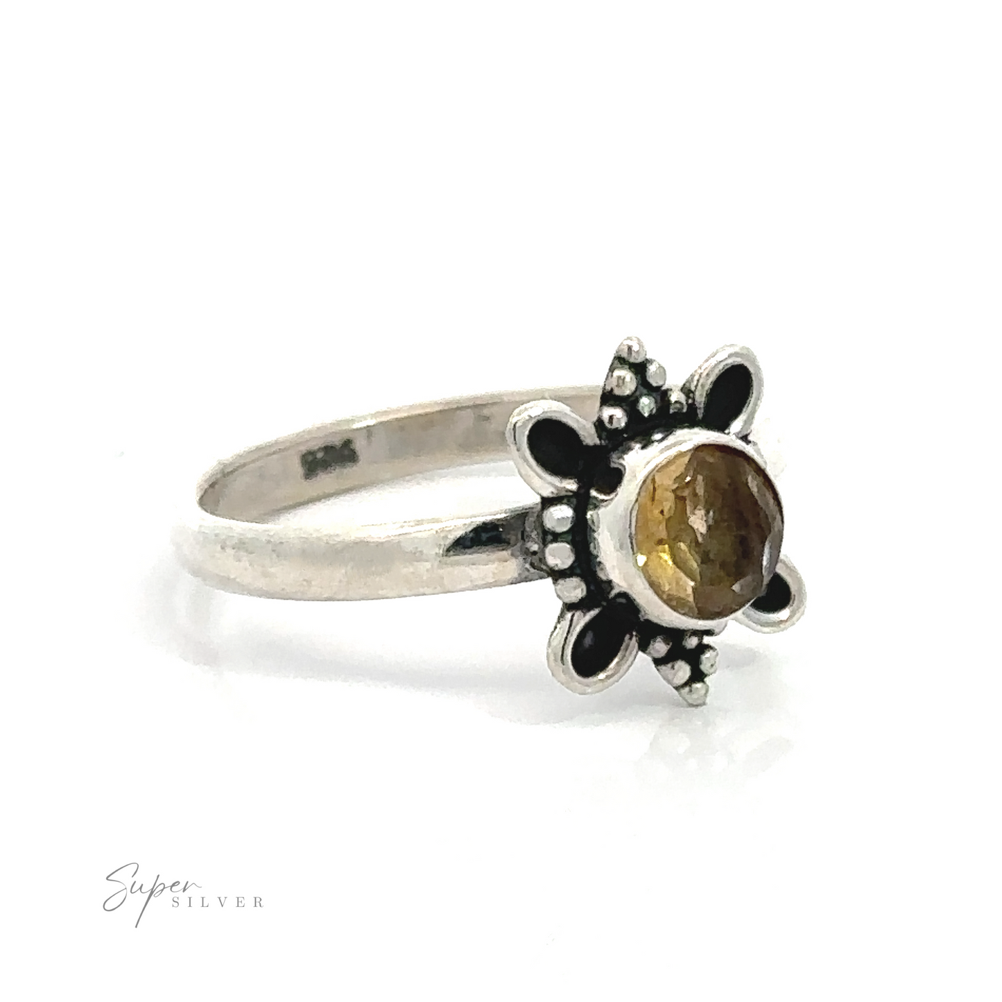 
                  
                    Round Faceted Gemstone Ring with Ball and Loop Design with a central amber gemstone.
                  
                