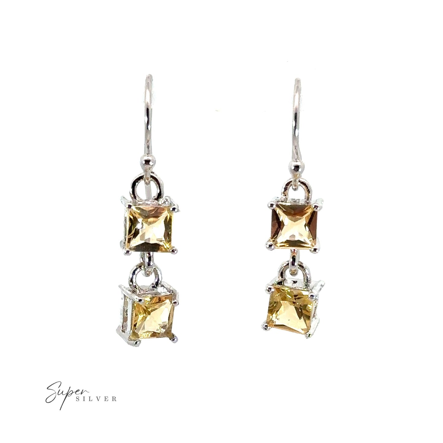 
                  
                    A pair of Elegant Faceted Gemstone Jewelry Set adorned with two citrine gemstones, exuding sophistication.
                  
                