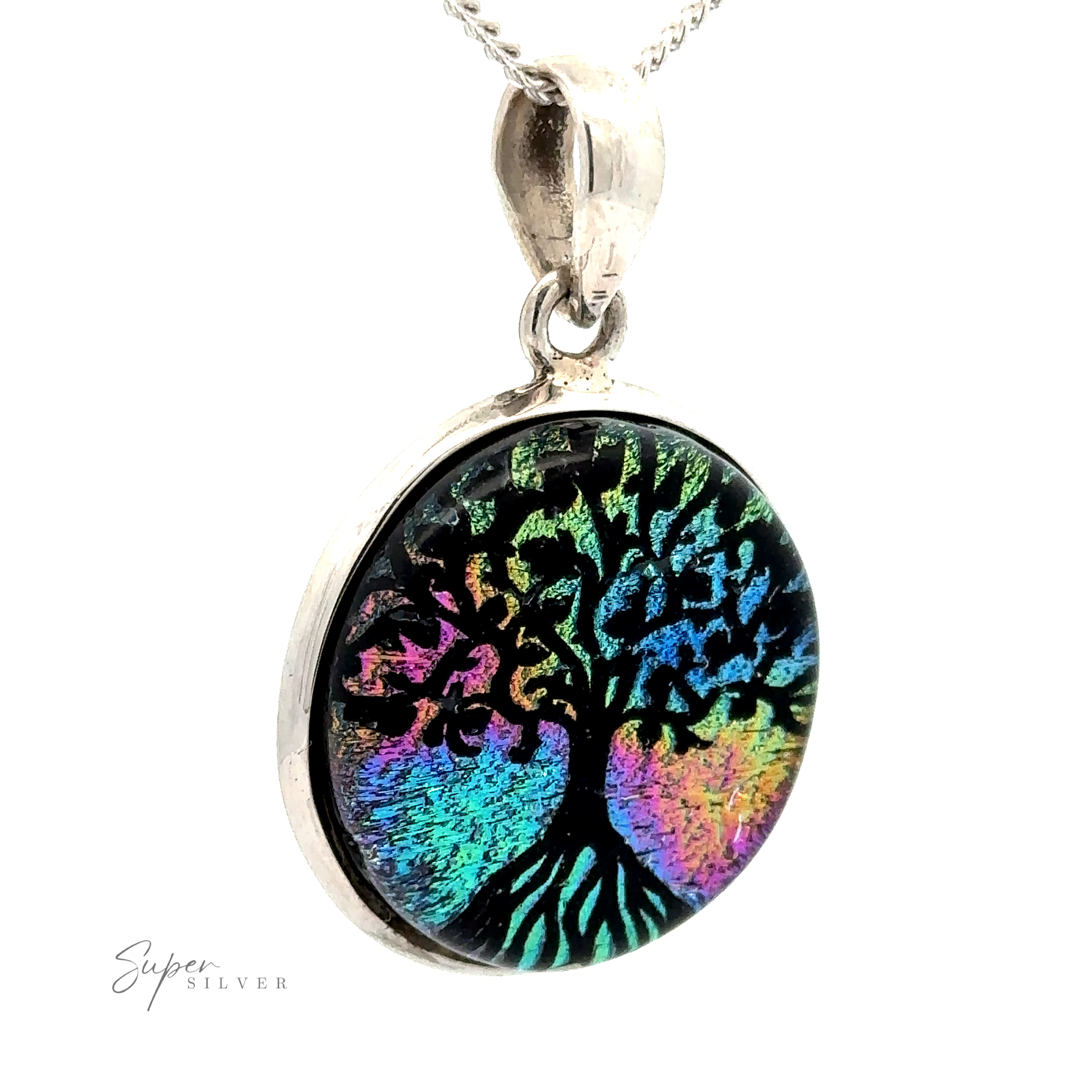 A round, sterling silver Dichroic Glass Tree Of Life Pendant with a rainbow-colored tree design on a dark background, hanging from a silver chain.