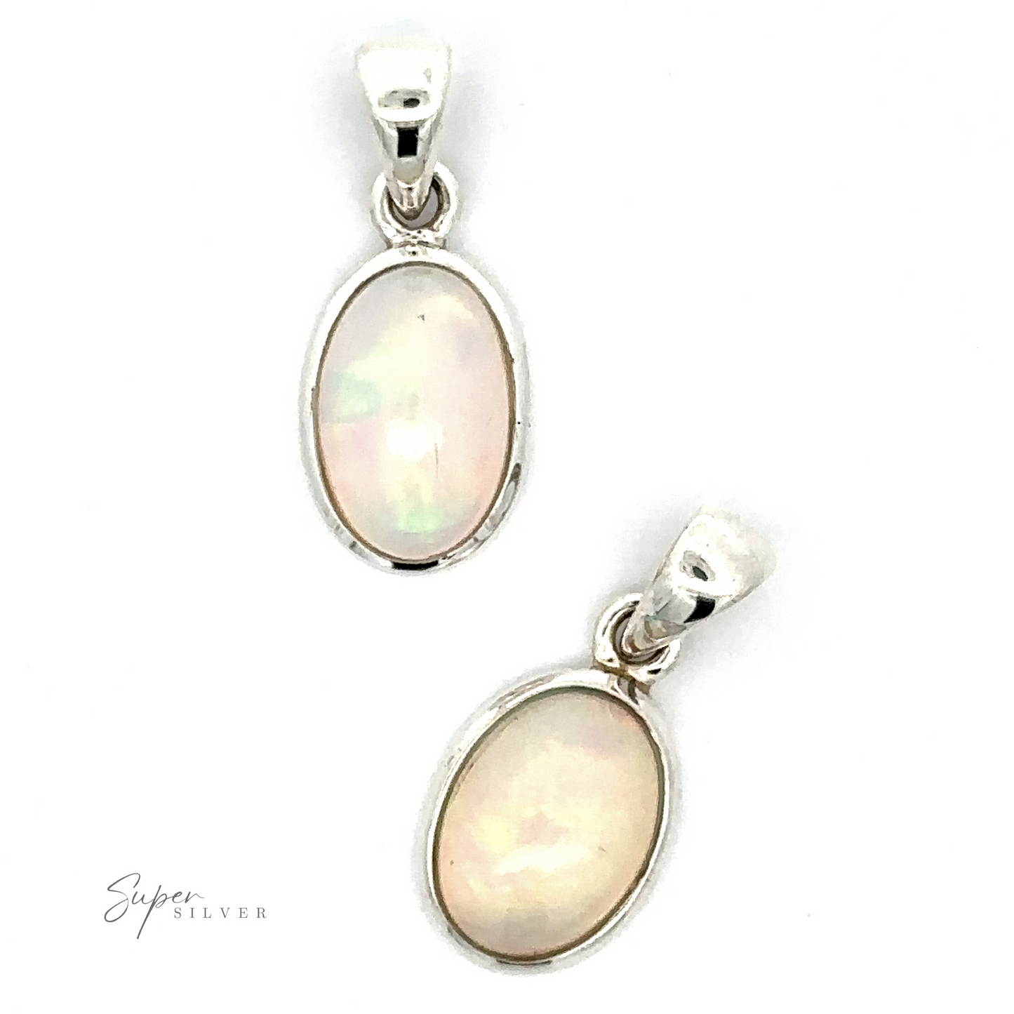 
                  
                    The Oval Ethiopian Opal Pendant showcases two exquisite oval-shaped gems set in sterling silver, complete with small loop bails that allow for easy attachment to a chain, embodying a minimalist aesthetic.
                  
                