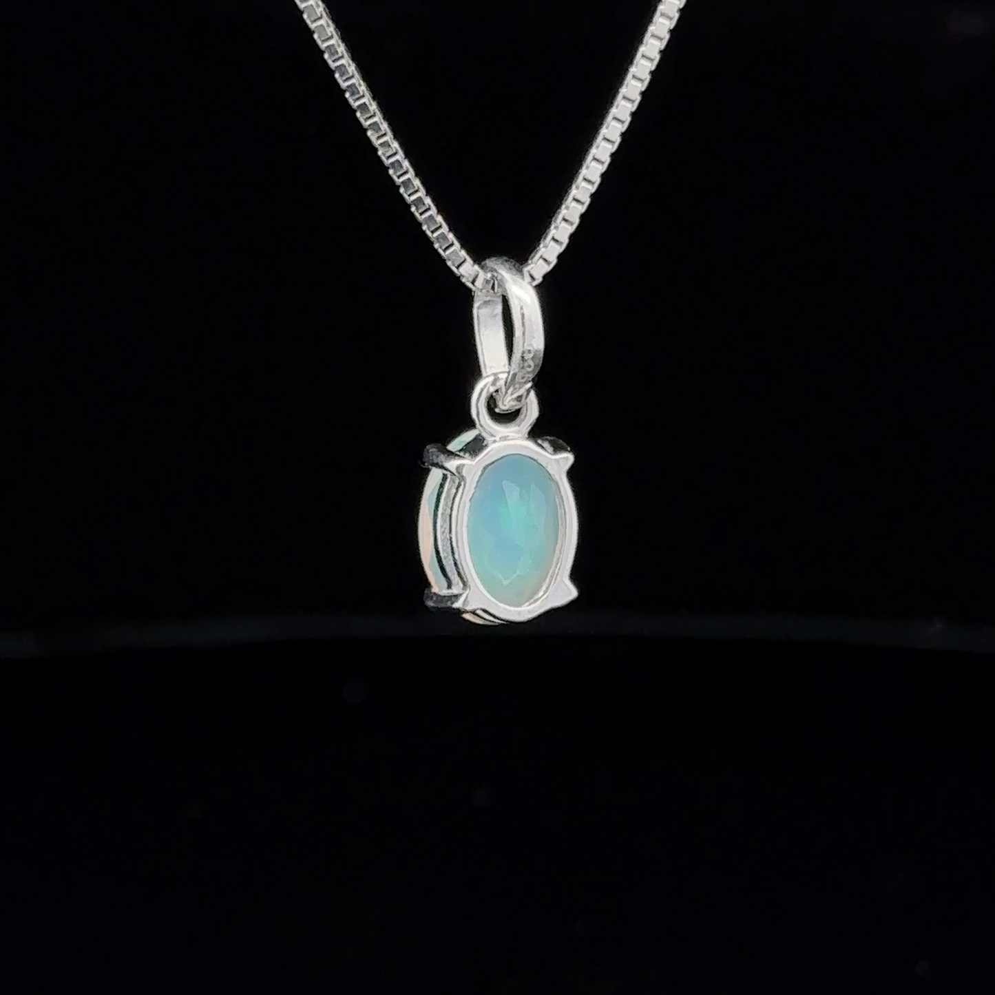 
                  
                    Tiny Oval Pronged Ethiopian Opal Pendant
                  
                