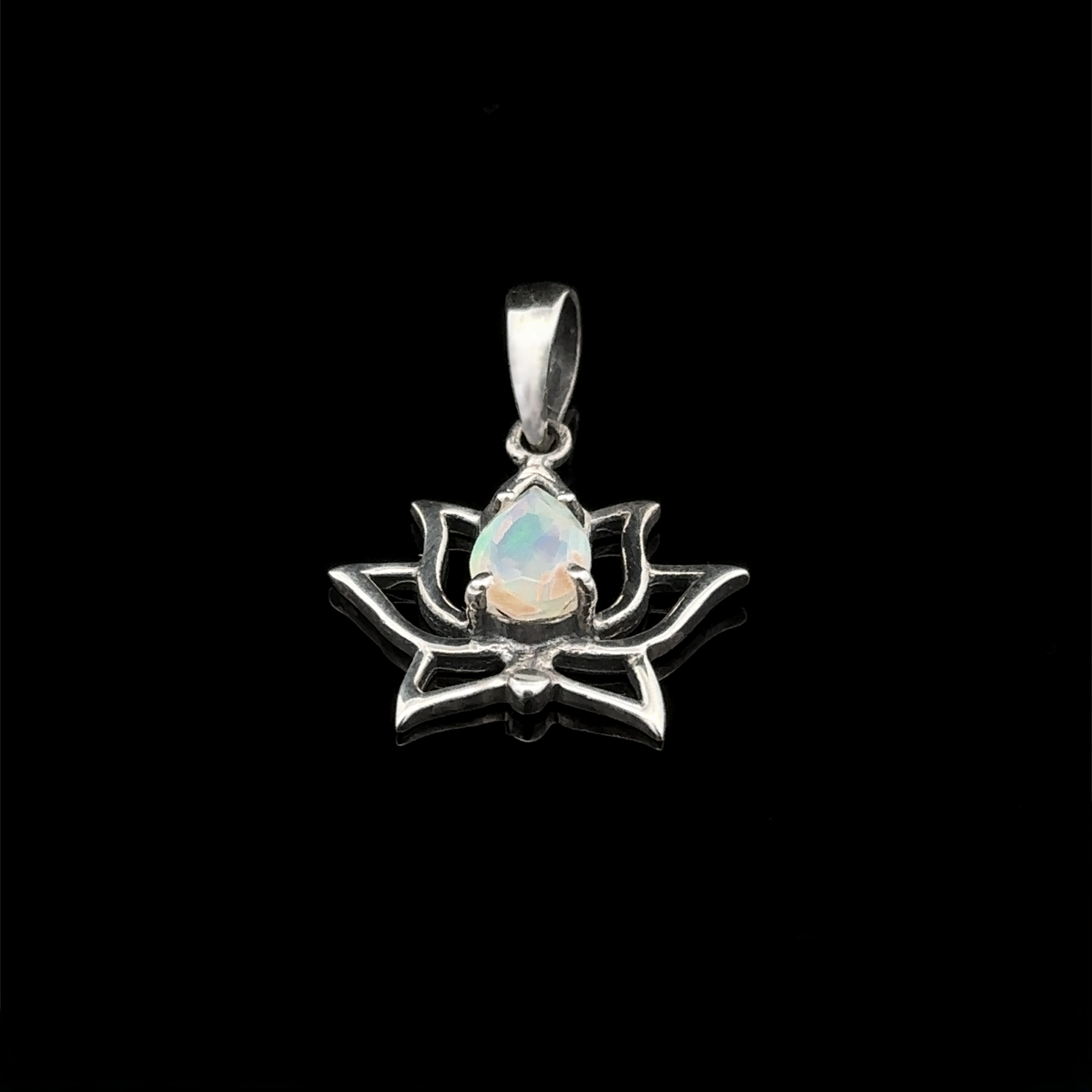 Ethiopian Opal Lotus Pendant featuring a sterling silver lotus flower with a pear-shaped Ethiopian opal stone set against a black background.