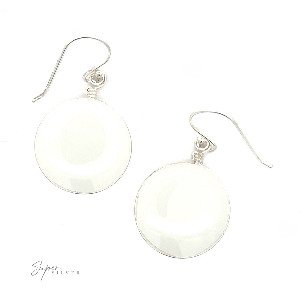
                  
                    A simple set of Round Glass Earrings with silver hooks and settings, displayed against a white background. The logo ".925 Sterling Silver" is in the bottom left corner.
                  
                