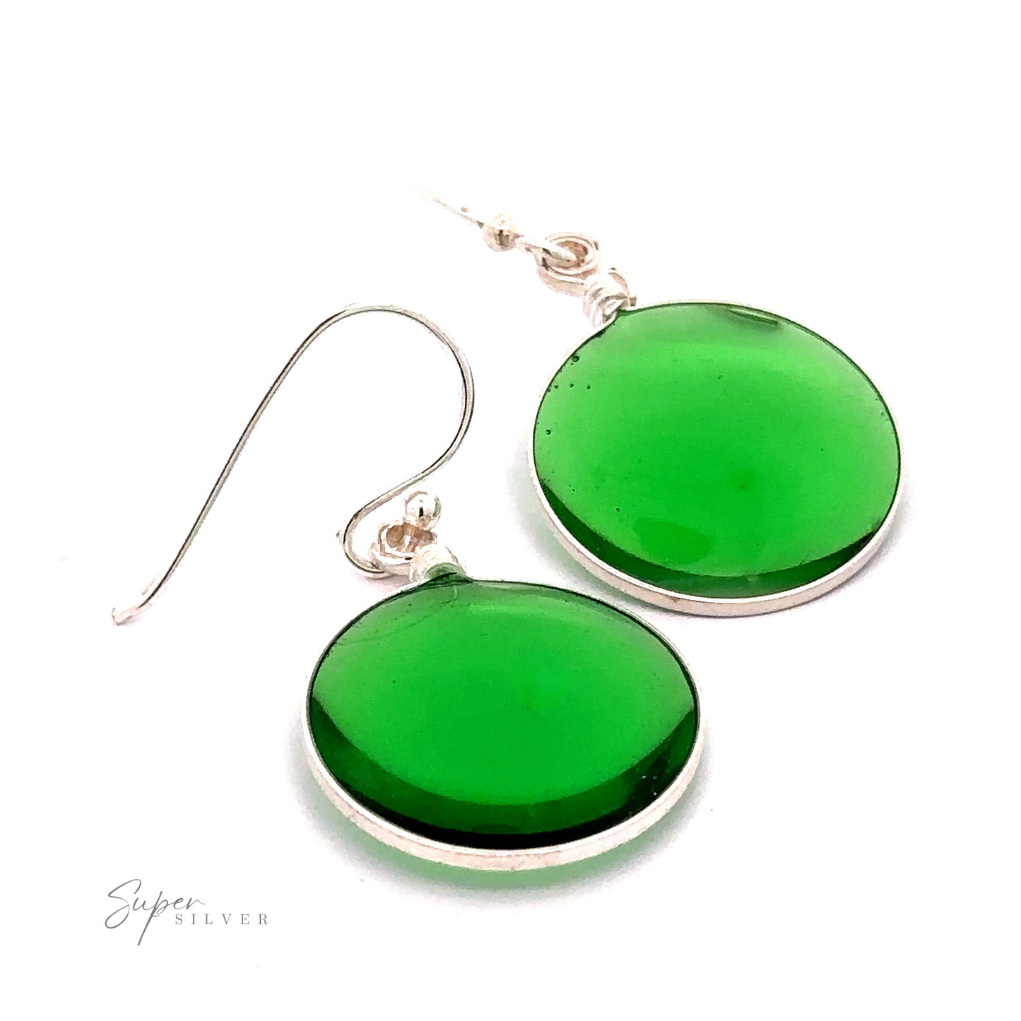 
                  
                    A simple set of Round Glass Earrings with silver hooks, each featuring a smooth, glossy green surface set in a thin .925 Sterling Silver rim. The image includes the text "Super Silver" in the bottom left corner.
                  
                