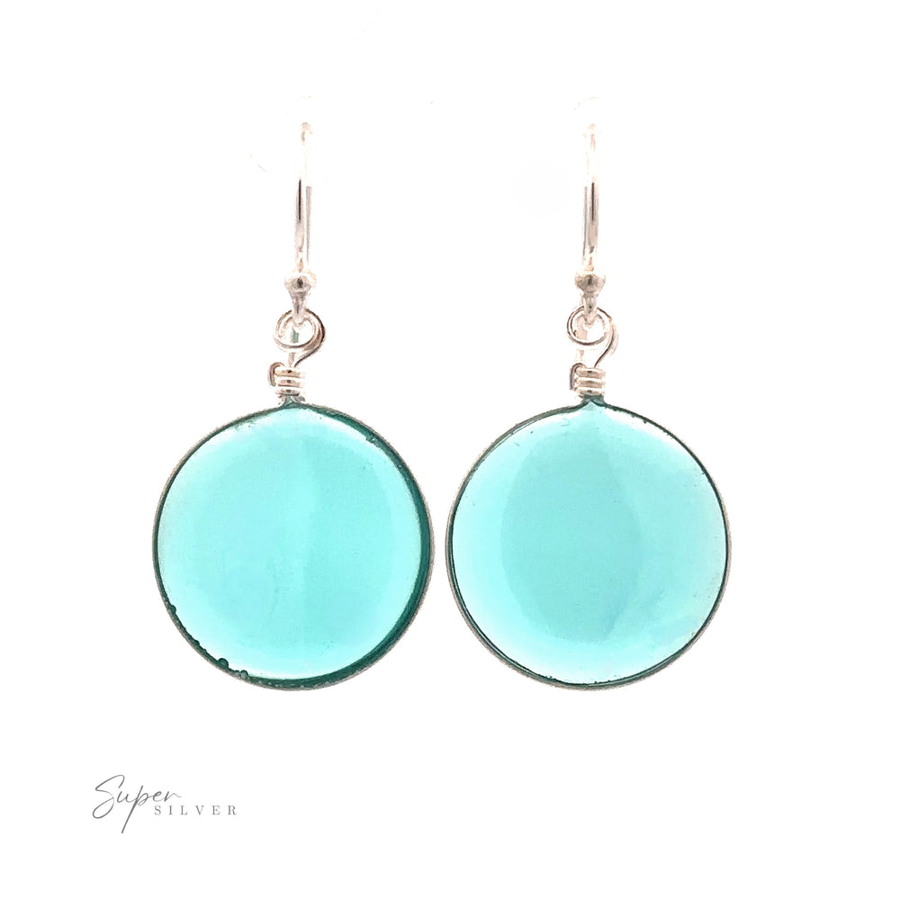 
                  
                    A simple set of Round Glass Earrings featuring round turquoise glass pendants.
                  
                