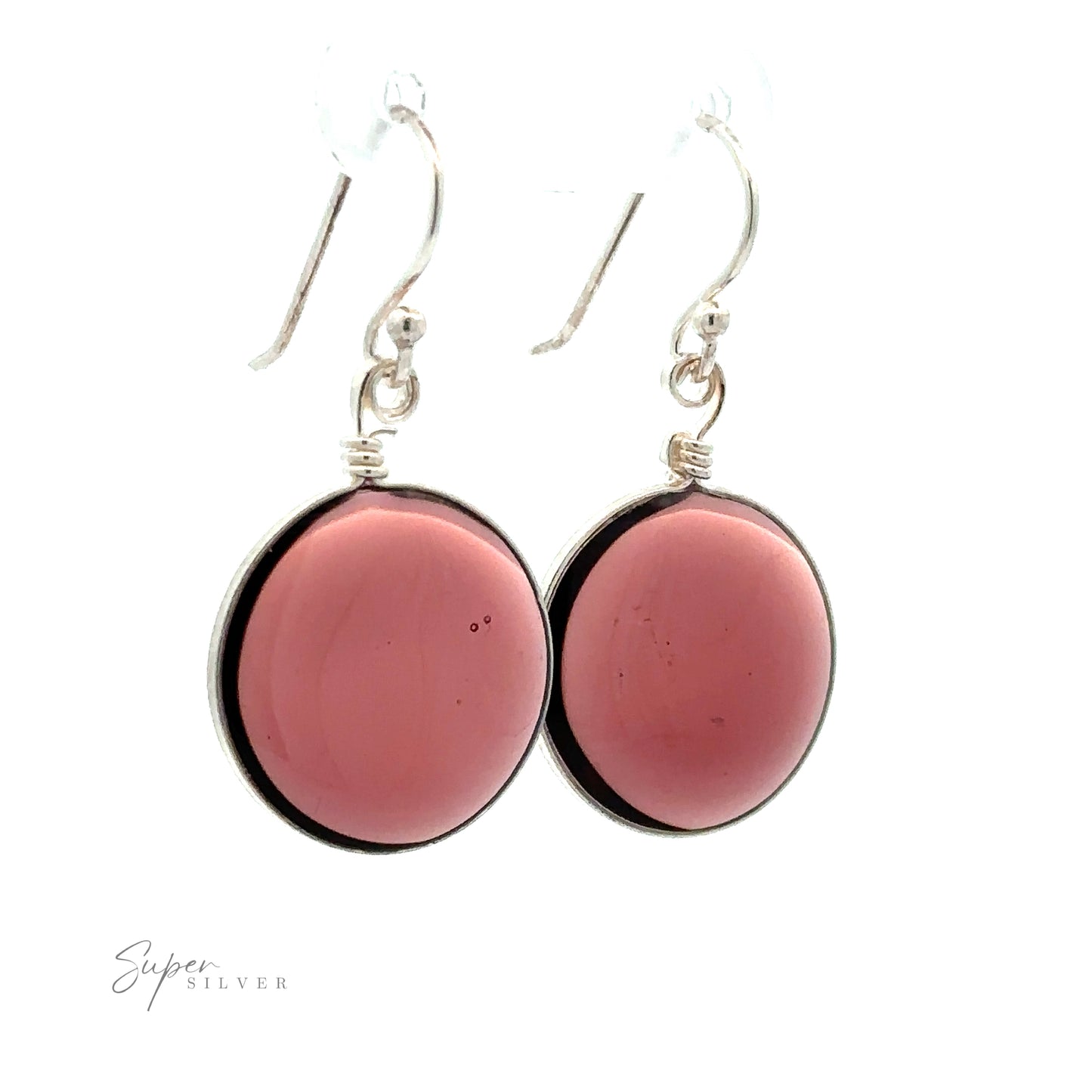 
                  
                    Close-up of a pair of silver hook earrings featuring large, round, pink stones in bezel settings, highlighting their .925 Sterling Silver composition with the text "Round Glass Earrings" in the bottom left corner.
                  
                