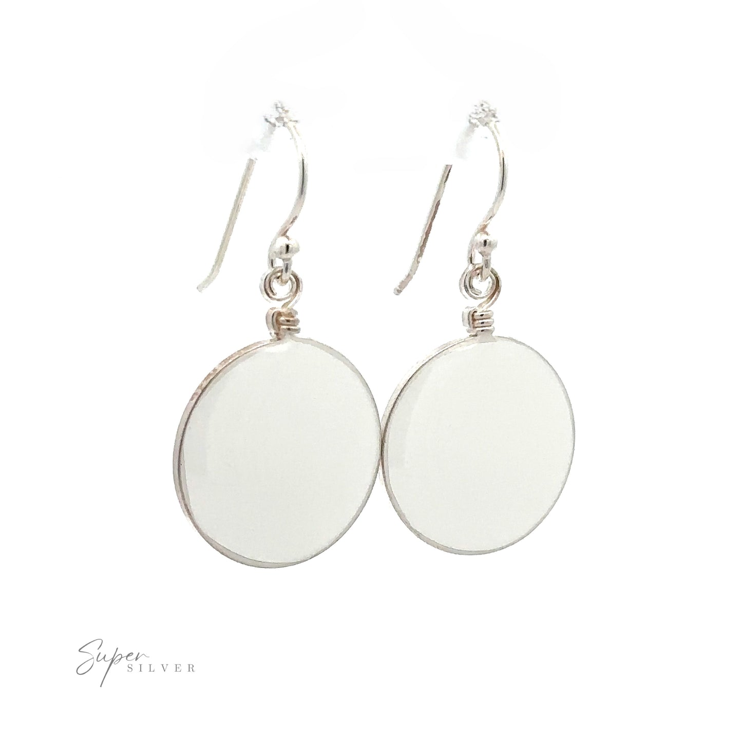 
                  
                    A pair of Round Glass Earrings with flat, round white pendants. The brand name "Super Silver" is visible in the bottom left corner.
                  
                