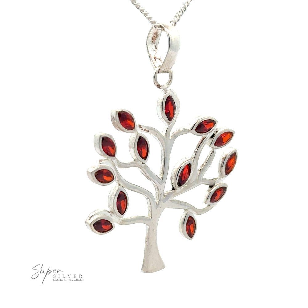 
                  
                    A Tree of Life Pendant with Stone Leaves hangs from a silver chain. The brand name "Super Silver" is visible in the bottom left corner, showcasing the elegance of .925 Sterling Silver.
                  
                