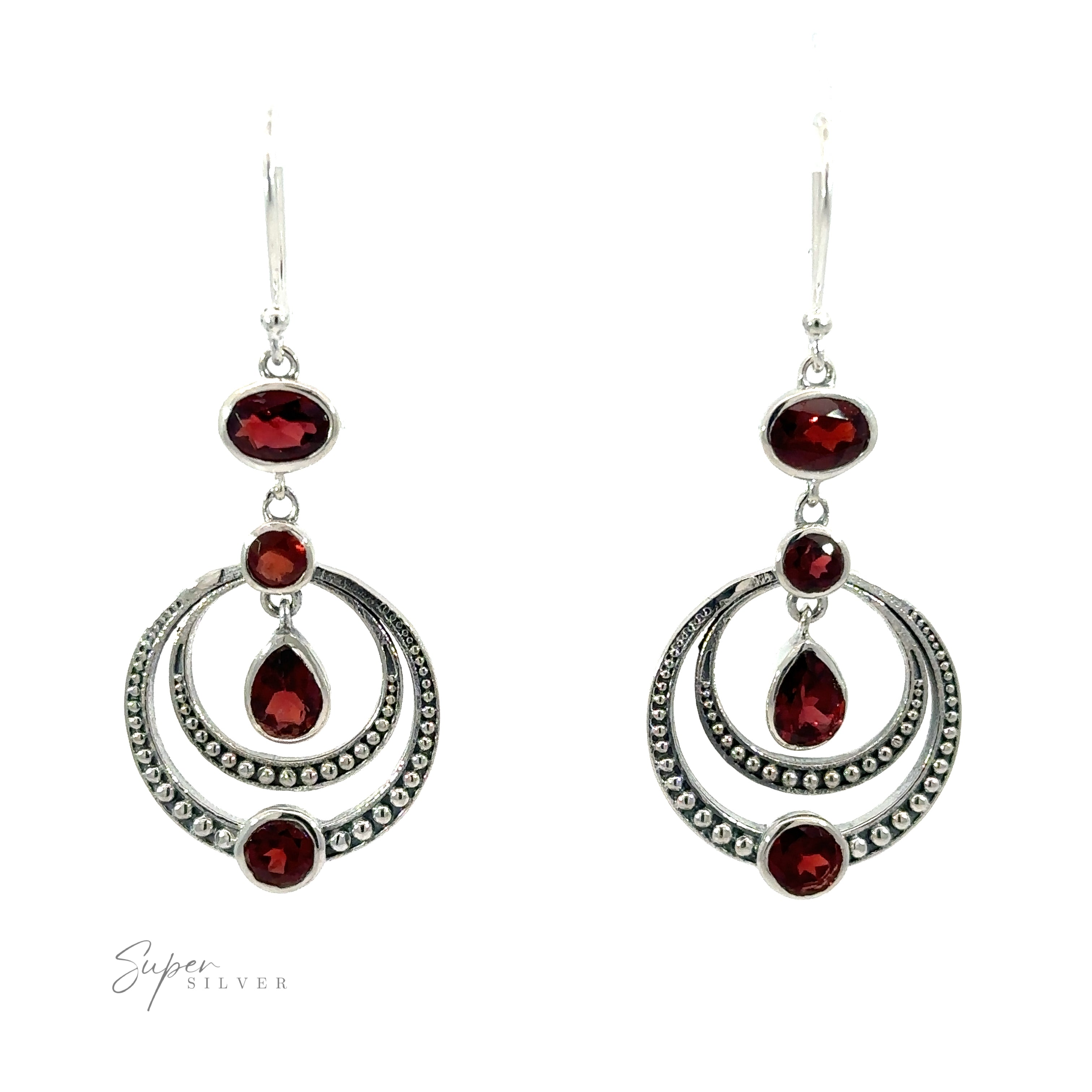A pair of Overlapping Circle Earrings with Vibrant Gemstones featuring red stones set in .925 Sterling Silver.