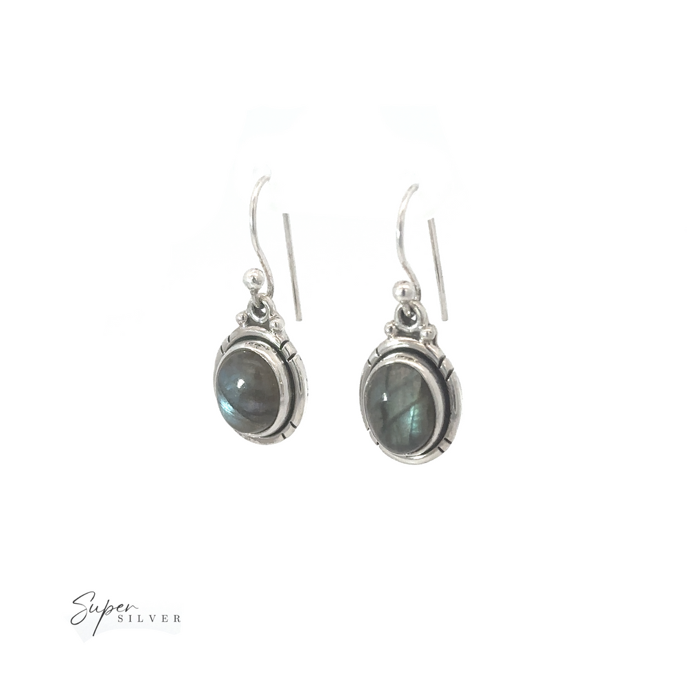 
                  
                    A pair of silver earrings with Oval Labradorite and Amethyst Dangle Earrings on a white background.
                  
                