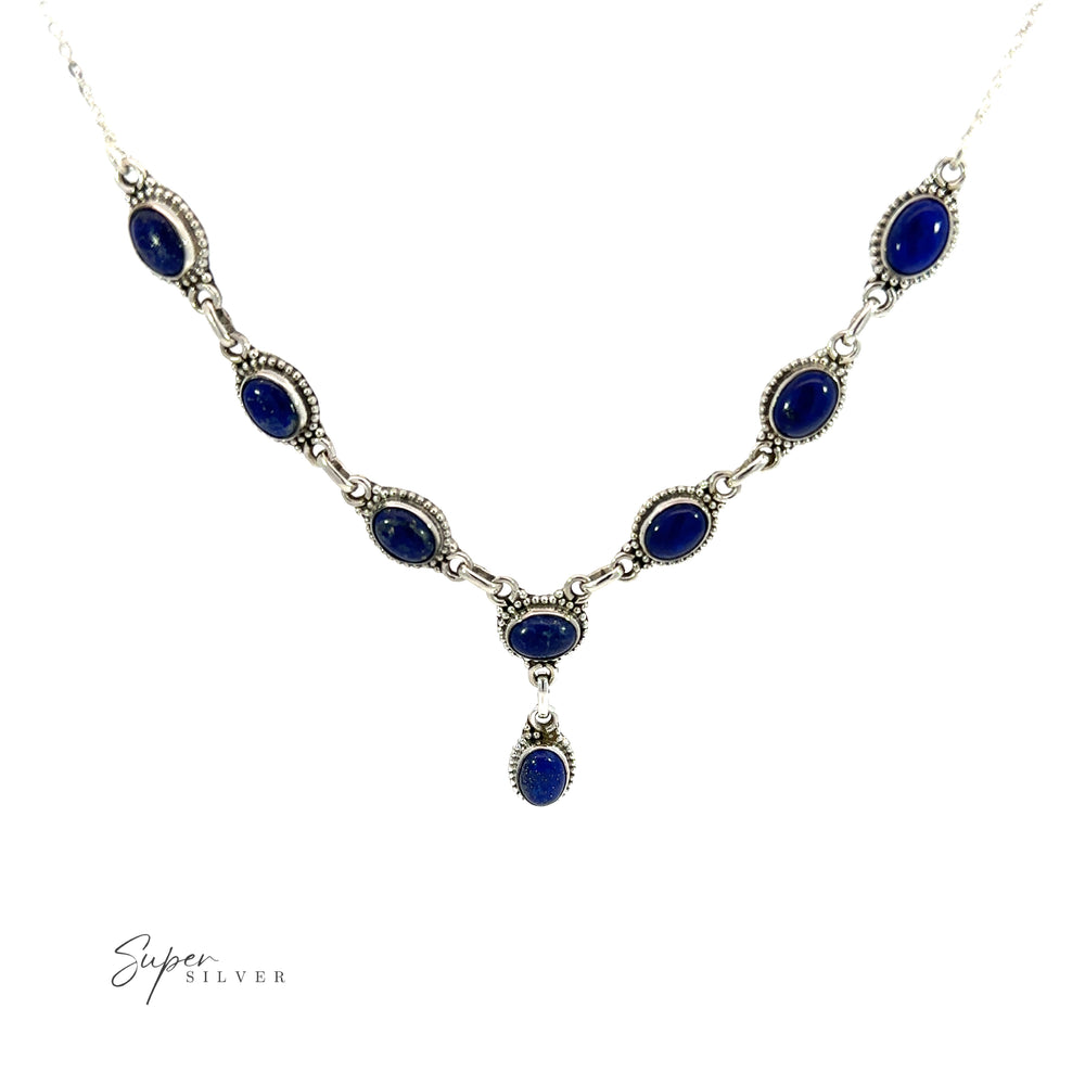 
                  
                    This Gemstone Y-Necklace with Beaded Border features a stunning Y-shaped design with lapis stones and a silver chain. Each gemstone is carefully selected for its vibrant color and natural beauty. The adjustable chain
                  
                