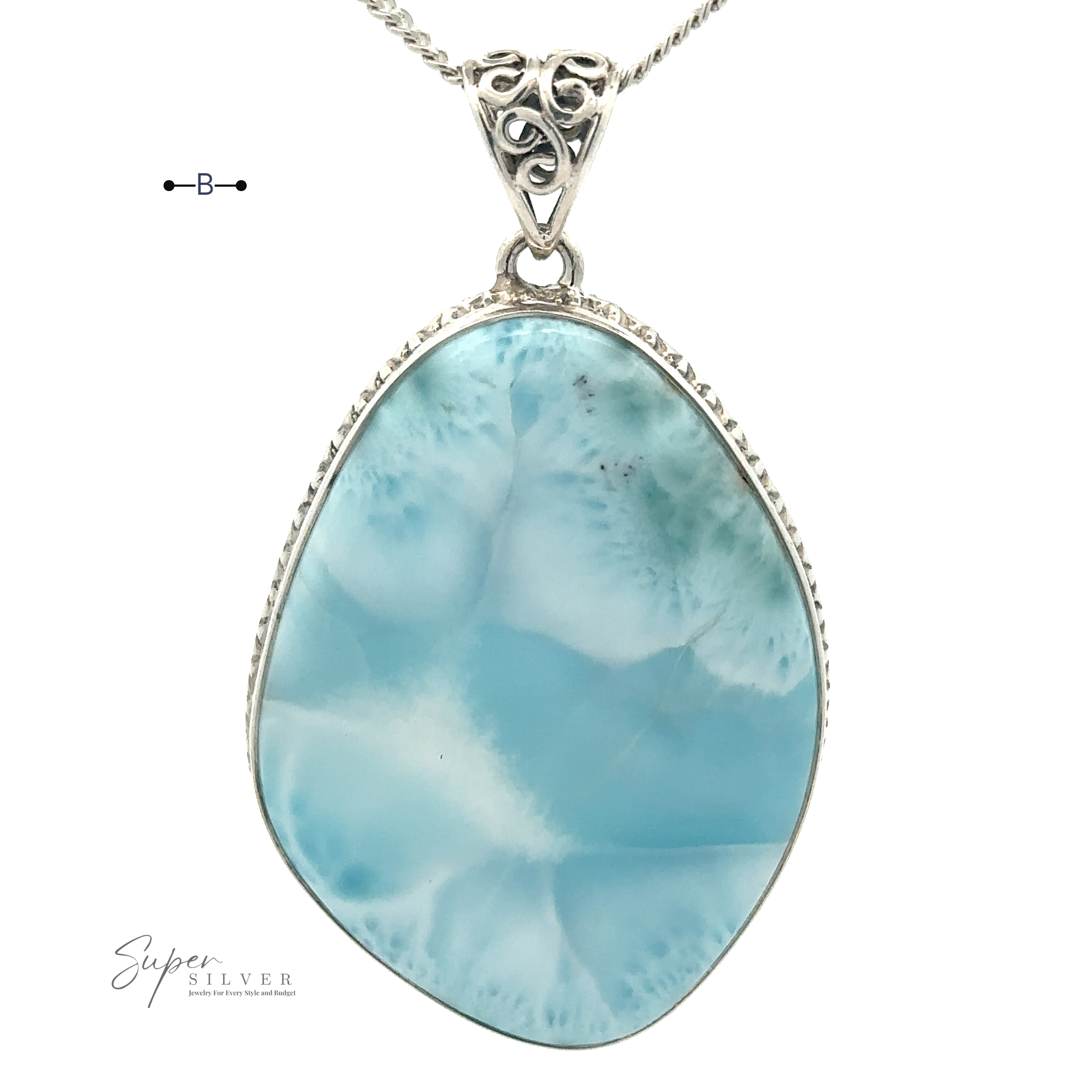 Close-up of a sterling silver necklace featuring a stunning blue and white Freeform Large Larimar Pendant. The gemstone showcases an irregular, teardrop-like shape with intricate filigree detailing at the top.