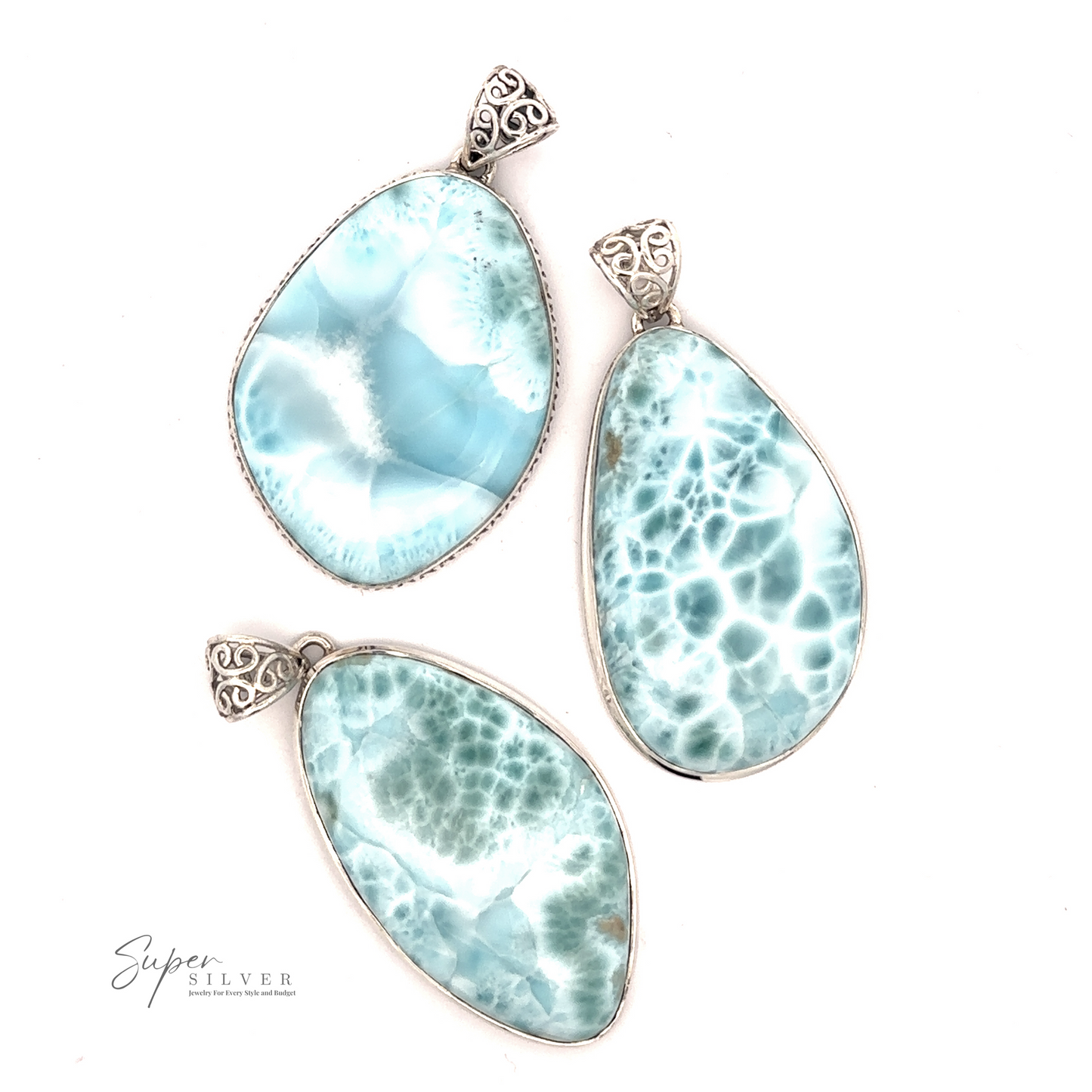 
                  
                    Three teardrop-shaped Freeform Large Larimar Pendants with intricate sterling silver bail designs are displayed on a white background. The left pendant has a smooth blue pattern, while the other two feature light blue and white patterns.
                  
                