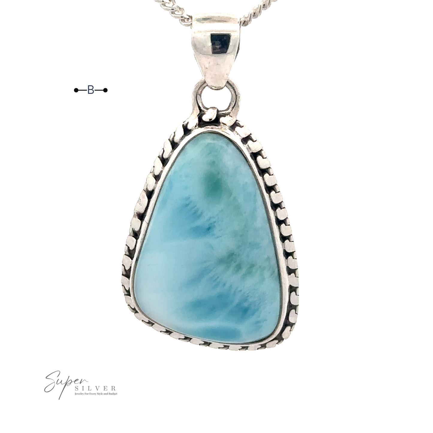 
                  
                    Larimar Pendant with Decorated Border with a stunning blue Larimar gemstone set in a decorative .925 Sterling Silver frame, hanging from a silver chain. The background is a plain white surface. Chain not included.
                  
                