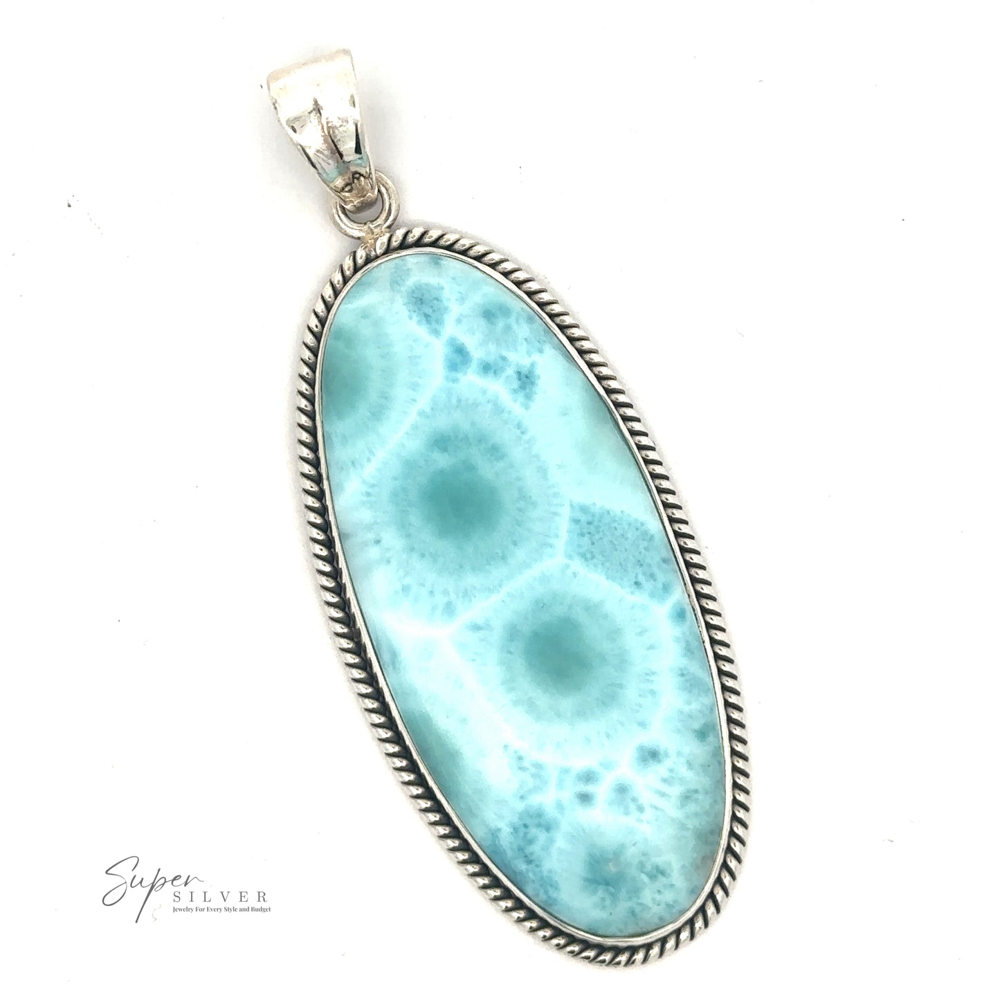 
                  
                    A 27x71mm silver pendant featuring an elongated oval-shaped blue gemstone with an intricate pattern, bordered by a twisted rope design, perfect for adding a touch of statement jewelry to any outfit. Crafted from sterling silver, it exudes elegance and timeless style: the Oblong Larimar Pendant with Rope Border.
                  
                