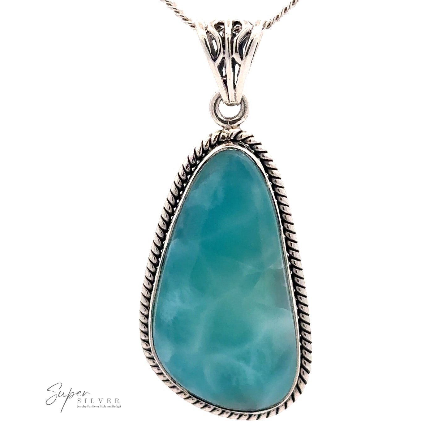 
                  
                    A striking Larimar Pendant with Rope Border featuring a teardrop-shaped blue stone set in a detailed Sterling Silver frame, hanging from a silver chain. The “Super Silver” logo is visible in the bottom left corner.
                  
                