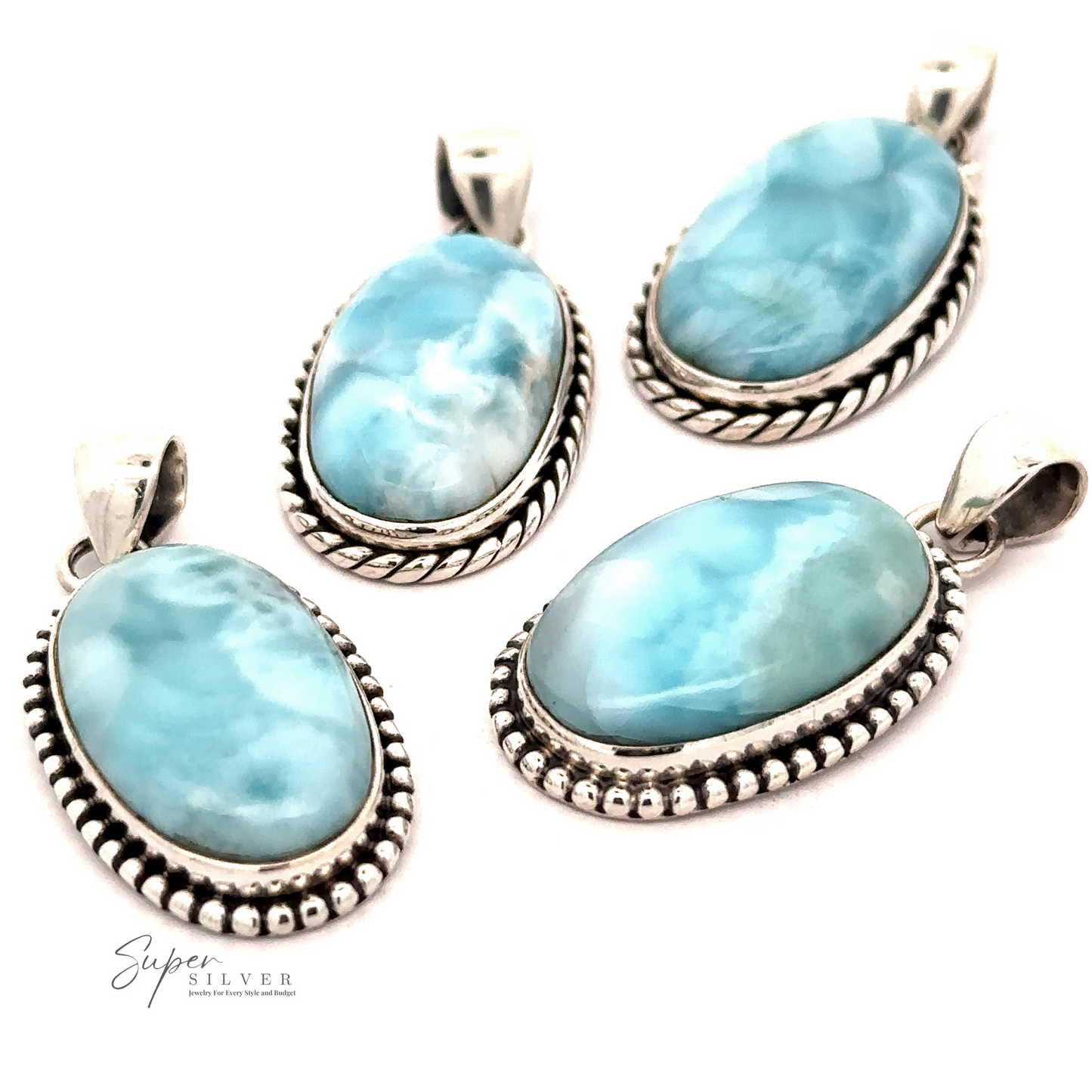 Four sterling silver pendants with blue oval gemstones are displayed against a white background. The Larimar Oval Pendant with Ball or Rope Border showcases different decorative silver borders.