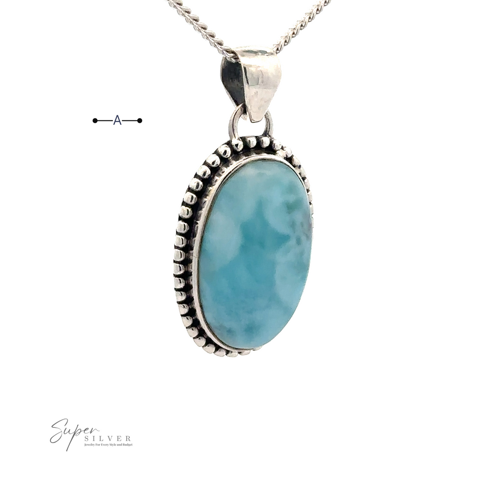 
                  
                    A Larimar Oval Pendant with Ball or Rope Border featuring an oval Larimar stone, hanging from a matching silver chain. The text "Super Silver" is visible in the lower left.
                  
                